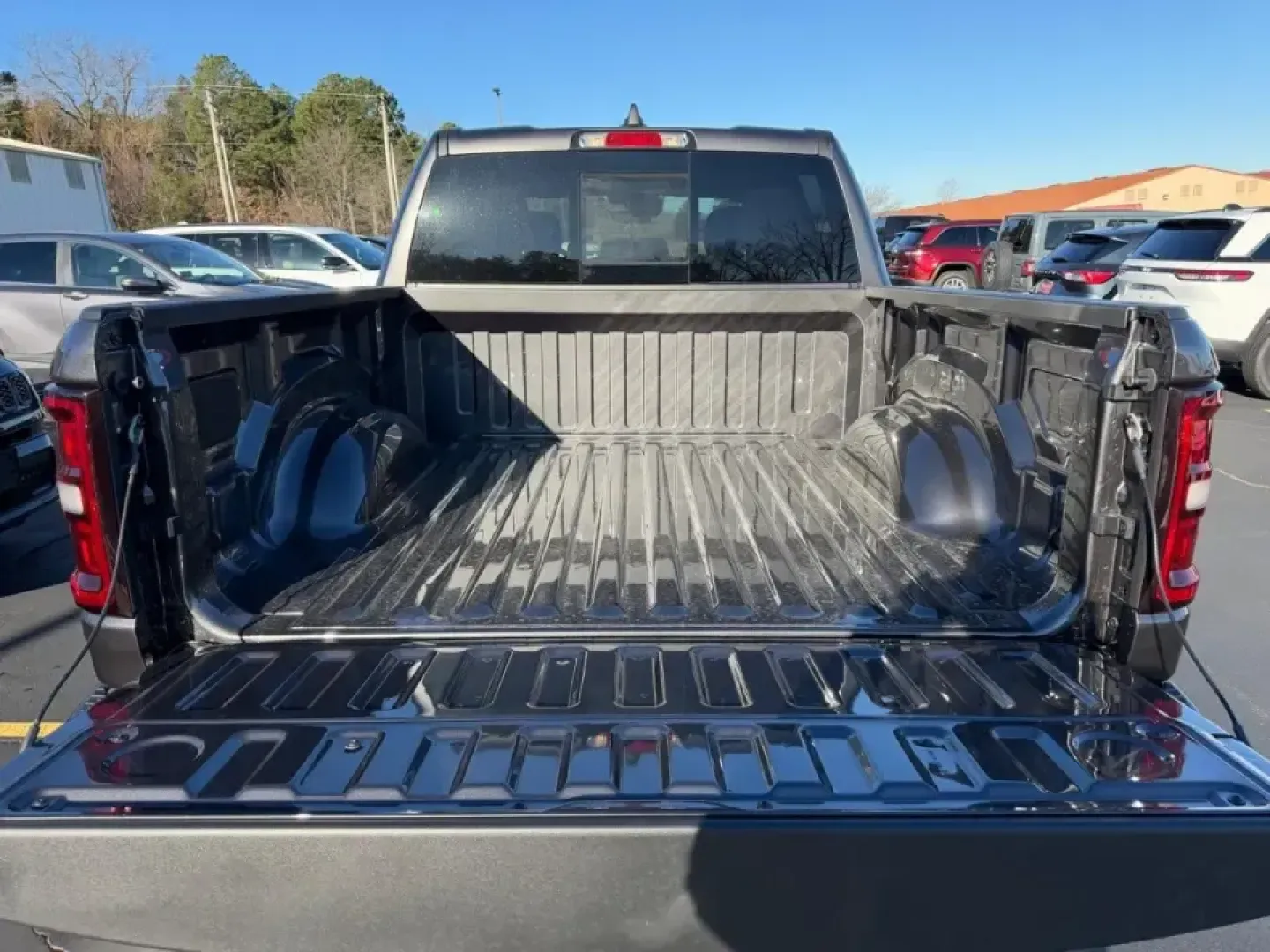 2026 /Black Cloth Ram 1500 Big Horn/Lone Star (1C6SRFFP1TN) with an 3.0L Straight 6 engine, 8A transmission, located at 970 Woodlawn Dr., Farmington, MO, 63640, (573) 431-7800, 37.825642, -90.468674 - Are you in search of a vehicle that can elevate your lifestyle, whether you're tackling weekend adventures, managing daily commutes, or hauling gear for family outings? Look no further! At Pettus CDJR Farmington, we proudly present a stunning 2026 Ram 1500 Big Horn that promises to be the perfect co - Photo#4
