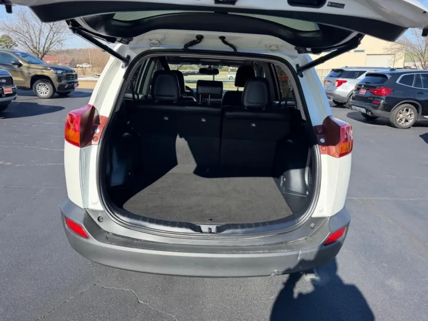 2013 /Black Leather Toyota RAV4 Limited (JTMDFREV8DD) with an 2.5L DOHC SFI 16-valve I4 engine, Automatic transmission, located at 970 Woodlawn Dr., Farmington, MO, 63640, (573) 431-7800, 37.825642, -90.468674 - **Adventure Awaits with This 2013 Toyota RAV4 Limited Perfect for Weekend Getaways!**<br /> <br /> If you're searching for a reliable and spacious SUV that can handle everything from daily commutes to weekend adventures, look no further! This 2013 Toyota RAV4 Limited, now available at Pettus CDJR F - Photo#4