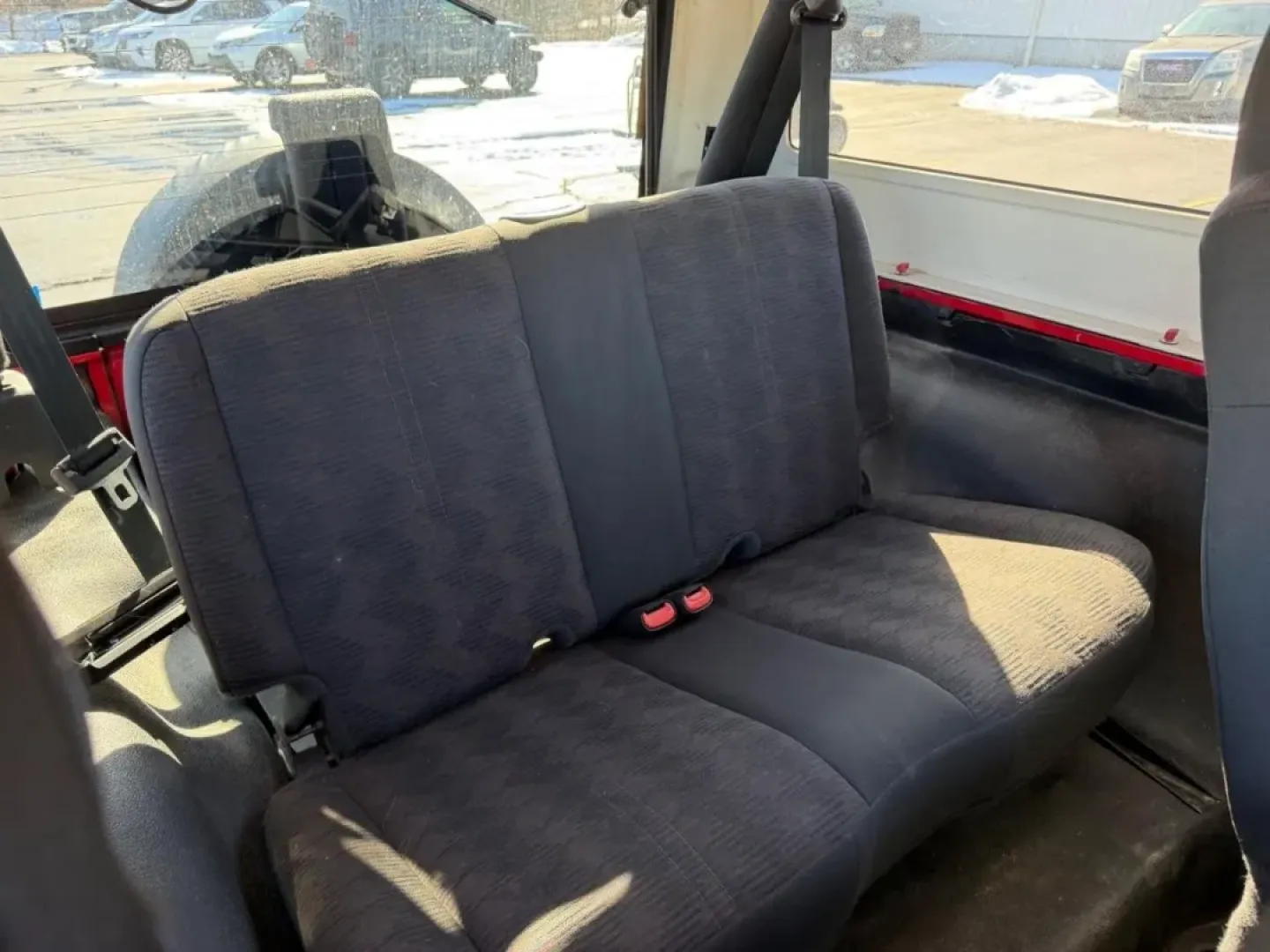 2004 /Dark Gray Cloth Jeep Wrangler Unlimited (1J4FA49S54P) with an 4.0L SMPI I6 engine, Automatic transmission, located at 970 Woodlawn Dr., Farmington, MO, 63640, (573) 431-7800, 37.825642, -90.468674 - Weekend trails, lake days, and top-down backroad drives are what the Jeep Wrangler was built for-and this 2004 Jeep Wrangler Sport makes it easy to turn an ordinary Saturday into an Ozarks-style adventure. With classic Wrangler simplicity, true Four Wheel Drive capability, and just 84,802 miles, it' - Photo#9