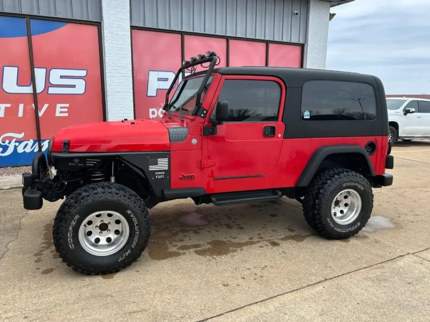 2004 /Dark Gray Cloth Jeep Wrangler Unlimited (1J4FA49S54P) with an 4.0L SMPI I6 engine, Automatic transmission, located at 970 Woodlawn Dr., Farmington, MO, 63640, (573) 431-7800, 37.825642, -90.468674 - Weekend trails, lake days, and top-down backroad drives are what the Jeep Wrangler was built for-and this 2004 Jeep Wrangler Sport makes it easy to turn an ordinary Saturday into an Ozarks-style adventure. With classic Wrangler simplicity, true Four Wheel Drive capability, and just 84,802 miles, it' - Photo#1