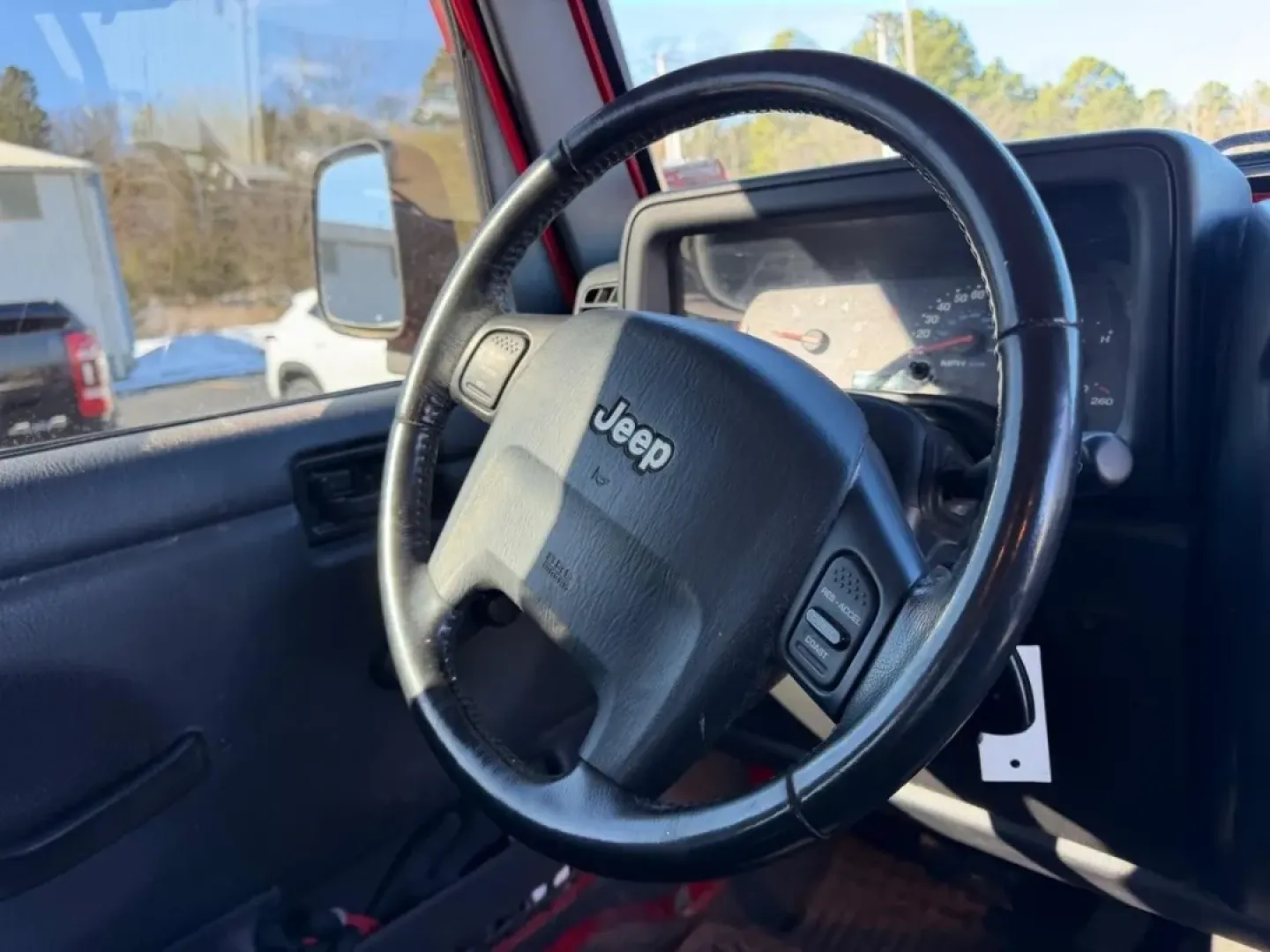 2004 /Dark Gray Cloth Jeep Wrangler Unlimited (1J4FA49S54P) with an 4.0L SMPI I6 engine, Automatic transmission, located at 970 Woodlawn Dr., Farmington, MO, 63640, (573) 431-7800, 37.825642, -90.468674 - Weekend trails, lake days, and top-down backroad drives are what the Jeep Wrangler was built for-and this 2004 Jeep Wrangler Sport makes it easy to turn an ordinary Saturday into an Ozarks-style adventure. With classic Wrangler simplicity, true Four Wheel Drive capability, and just 84,802 miles, it' - Photo#11