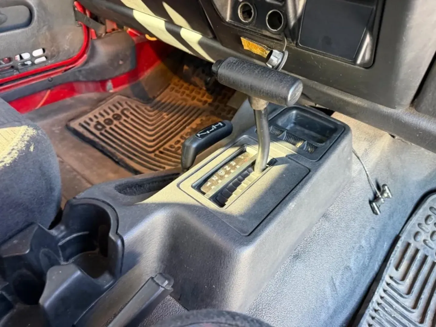 2004 /Dark Gray Cloth Jeep Wrangler Unlimited (1J4FA49S54P) with an 4.0L SMPI I6 engine, Automatic transmission, located at 970 Woodlawn Dr., Farmington, MO, 63640, (573) 431-7800, 37.825642, -90.468674 - Weekend trails, lake days, and top-down backroad drives are what the Jeep Wrangler was built for-and this 2004 Jeep Wrangler Sport makes it easy to turn an ordinary Saturday into an Ozarks-style adventure. With classic Wrangler simplicity, true Four Wheel Drive capability, and just 84,802 miles, it' - Photo#16