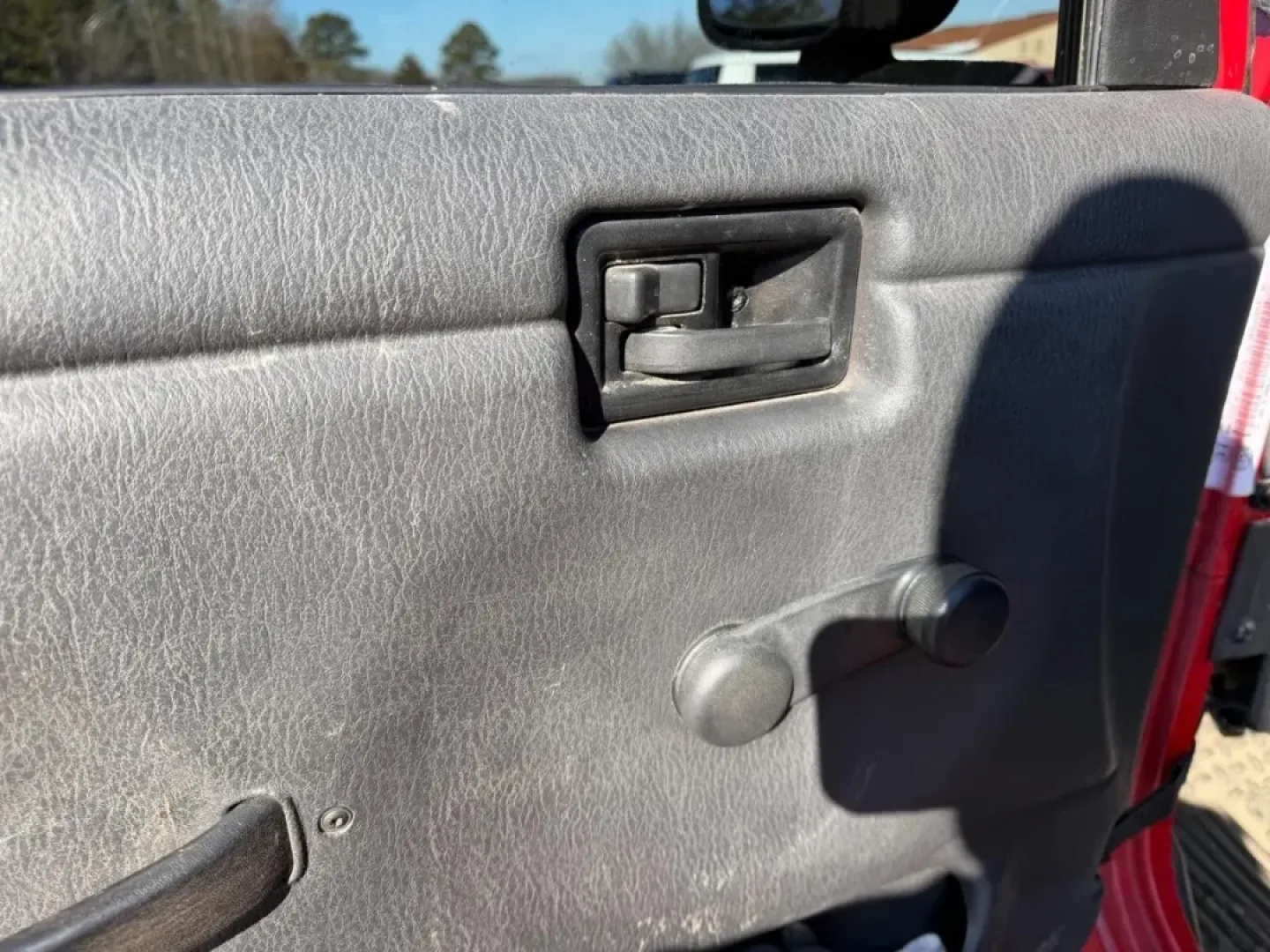 2004 /Dark Gray Cloth Jeep Wrangler Unlimited (1J4FA49S54P) with an 4.0L SMPI I6 engine, Automatic transmission, located at 970 Woodlawn Dr., Farmington, MO, 63640, (573) 431-7800, 37.825642, -90.468674 - Weekend trails, lake days, and top-down backroad drives are what the Jeep Wrangler was built for-and this 2004 Jeep Wrangler Sport makes it easy to turn an ordinary Saturday into an Ozarks-style adventure. With classic Wrangler simplicity, true Four Wheel Drive capability, and just 84,802 miles, it' - Photo#18