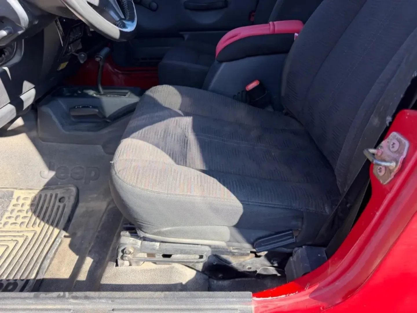 2004 /Dark Gray Cloth Jeep Wrangler Unlimited (1J4FA49S54P) with an 4.0L SMPI I6 engine, Automatic transmission, located at 970 Woodlawn Dr., Farmington, MO, 63640, (573) 431-7800, 37.825642, -90.468674 - Weekend trails, lake days, and top-down backroad drives are what the Jeep Wrangler was built for-and this 2004 Jeep Wrangler Sport makes it easy to turn an ordinary Saturday into an Ozarks-style adventure. With classic Wrangler simplicity, true Four Wheel Drive capability, and just 84,802 miles, it' - Photo#19