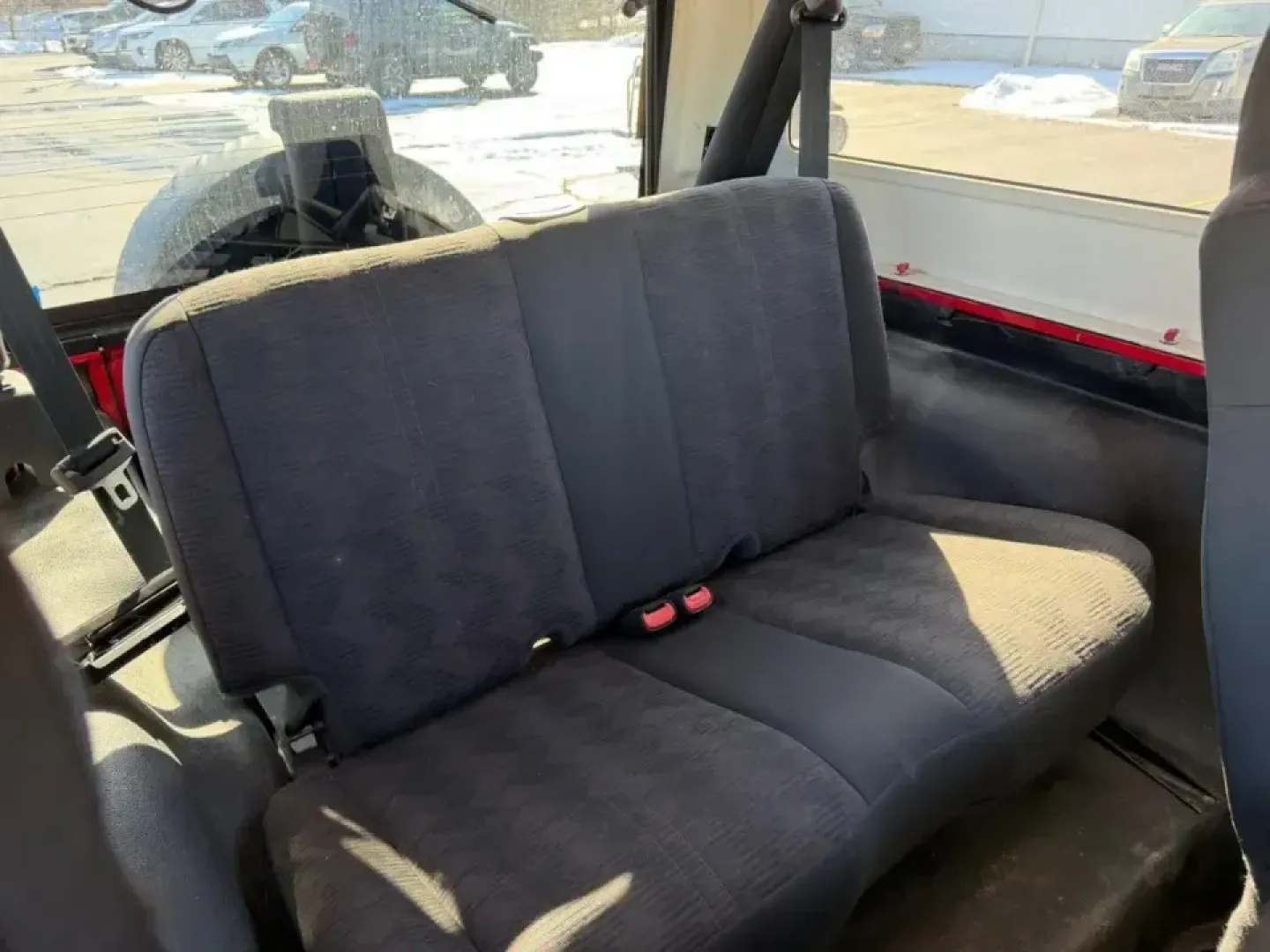 2004 /Dark Gray Cloth Jeep Wrangler Unlimited (1J4FA49S54P) with an 4.0L SMPI I6 engine, Automatic transmission, located at 970 Woodlawn Dr., Farmington, MO, 63640, (573) 431-7800, 37.825642, -90.468674 - Weekend trails, lake days, and top-down backroad drives are what the Jeep Wrangler was built for-and this 2004 Jeep Wrangler Sport makes it easy to turn an ordinary Saturday into an Ozarks-style adventure. With classic Wrangler simplicity, true Four Wheel Drive capability, and just 84,802 miles, it' - Photo#10