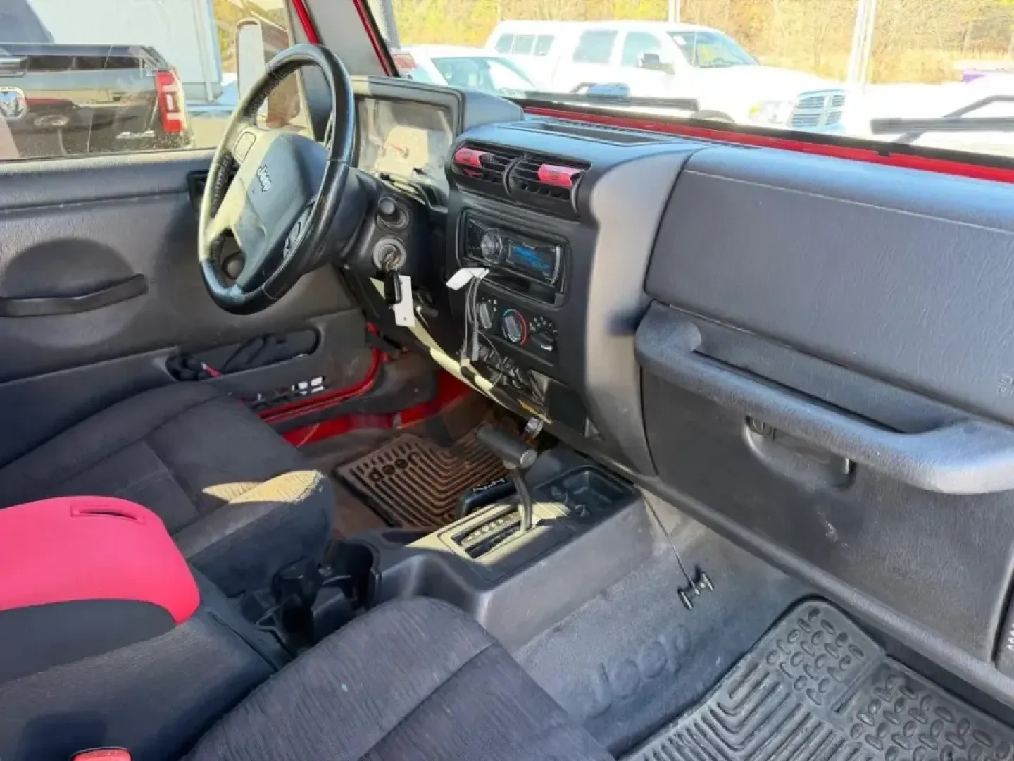 2004 /Dark Gray Cloth Jeep Wrangler Unlimited (1J4FA49S54P) with an 4.0L SMPI I6 engine, Automatic transmission, located at 970 Woodlawn Dr., Farmington, MO, 63640, (573) 431-7800, 37.825642, -90.468674 - Weekend trails, lake days, and top-down backroad drives are what the Jeep Wrangler was built for-and this 2004 Jeep Wrangler Sport makes it easy to turn an ordinary Saturday into an Ozarks-style adventure. With classic Wrangler simplicity, true Four Wheel Drive capability, and just 84,802 miles, it' - Photo#11