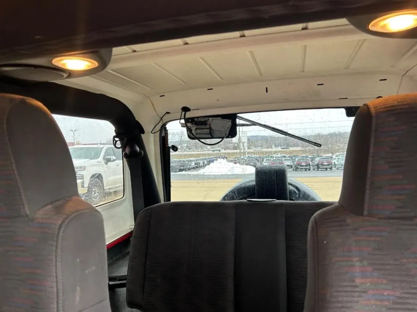 2004 /Dark Gray Cloth Jeep Wrangler Unlimited (1J4FA49S54P) with an 4.0L SMPI I6 engine, Automatic transmission, located at 970 Woodlawn Dr., Farmington, MO, 63640, (573) 431-7800, 37.825642, -90.468674 - Weekend trails, lake days, and top-down backroad drives are what the Jeep Wrangler was built for-and this 2004 Jeep Wrangler Sport makes it easy to turn an ordinary Saturday into an Ozarks-style adventure. With classic Wrangler simplicity, true Four Wheel Drive capability, and just 84,802 miles, it' - Photo#7