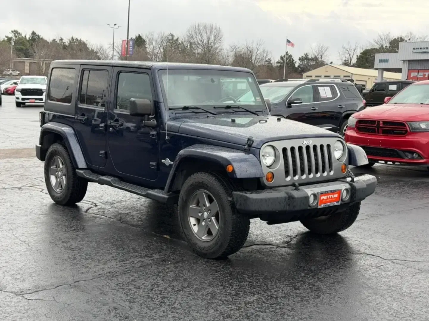 2013 /Black Interior Leather Trimmed Jeep Wrangler Unlimited Freedom Edition (1C4BJWDG7DL) with an 3.6L SMPI 24V VVT V6 engine, Automatic transmission, located at 970 Woodlawn Dr., Farmington, MO, 63640, (573) 431-7800, 37.825642, -90.468674 - Weekend trail runs, summer float trips, and spontaneous road trips down Highway 67 feel a lot more possible when your SUV is built for adventure and everyday practicality. This 2013 Jeep Wrangler Unlimited Freedom Edition is the kind of vehicle that fits an active Missouri lifestyle-roomy enough for - Photo#0
