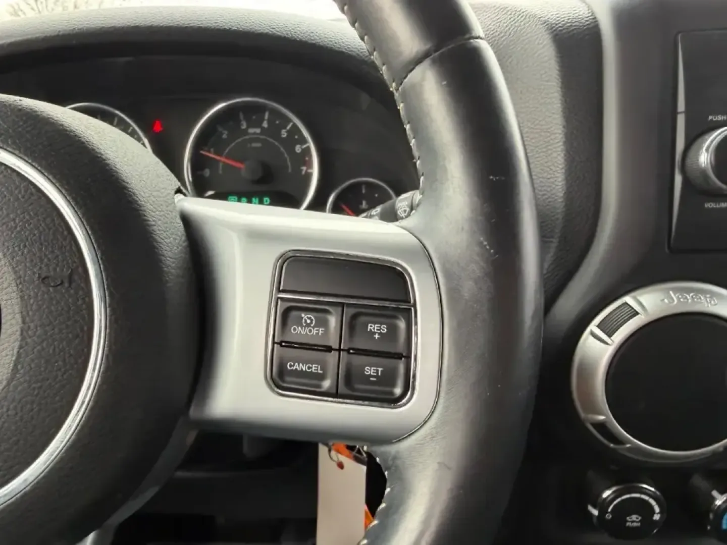 2013 /Black Interior Leather Trimmed Jeep Wrangler Unlimited Freedom Edition (1C4BJWDG7DL) with an 3.6L SMPI 24V VVT V6 engine, Automatic transmission, located at 970 Woodlawn Dr., Farmington, MO, 63640, (573) 431-7800, 37.825642, -90.468674 - Weekend trail runs, summer float trips, and spontaneous road trips down Highway 67 feel a lot more possible when your SUV is built for adventure and everyday practicality. This 2013 Jeep Wrangler Unlimited Freedom Edition is the kind of vehicle that fits an active Missouri lifestyle-roomy enough for - Photo#12