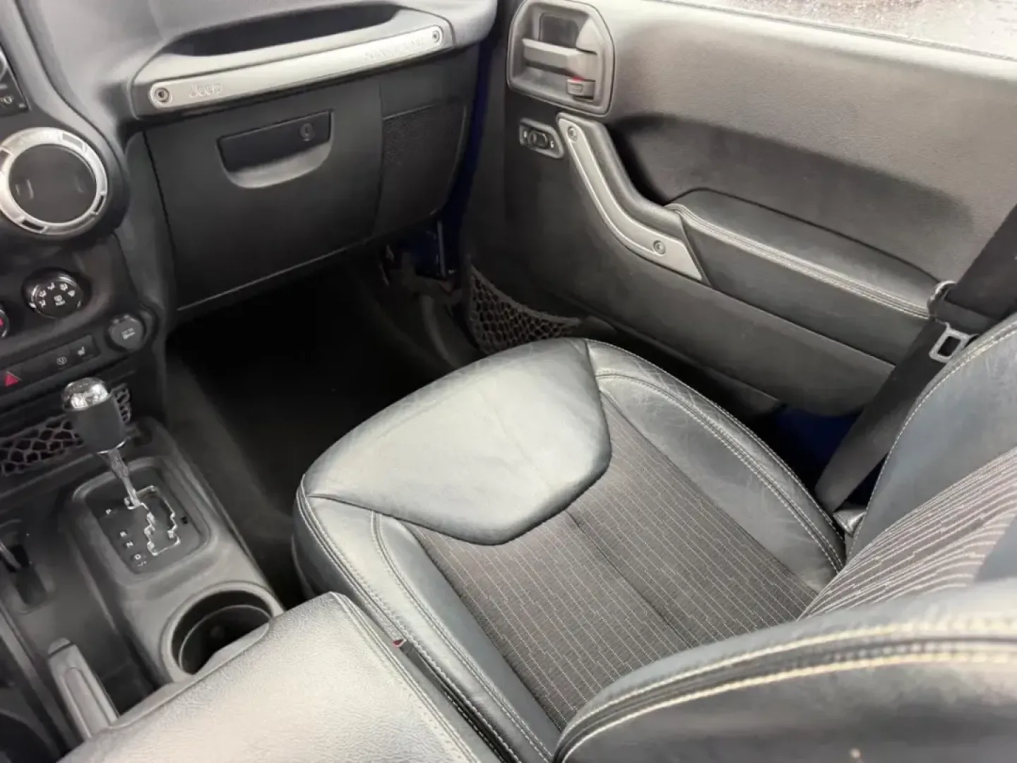 2013 /Black Interior Leather Trimmed Jeep Wrangler Unlimited Freedom Edition (1C4BJWDG7DL) with an 3.6L SMPI 24V VVT V6 engine, Automatic transmission, located at 970 Woodlawn Dr., Farmington, MO, 63640, (573) 431-7800, 37.825642, -90.468674 - Weekend trail runs, summer float trips, and spontaneous road trips down Highway 67 feel a lot more possible when your SUV is built for adventure and everyday practicality. This 2013 Jeep Wrangler Unlimited Freedom Edition is the kind of vehicle that fits an active Missouri lifestyle-roomy enough for - Photo#16