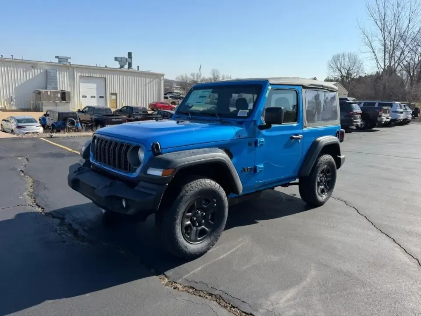 2026 /Black Cloth Jeep Wrangler Sport (1C4PJXAN5TW) with an 2.0L engine, 6M transmission, located at 970 Woodlawn Dr., Farmington, MO, 63640, (573) 431-7800, 37.825642, -90.468674 - Weekend trails, lake days, and winter-weather confidence all start with the right SUV-and this **2026 Jeep Wrangler Sport 4x4** is built for the Farmington lifestyle. Whether you're packing up for a quick escape to **St. Joe State Park**, heading out toward **Flat River** for fishing, or just commut - Photo#6