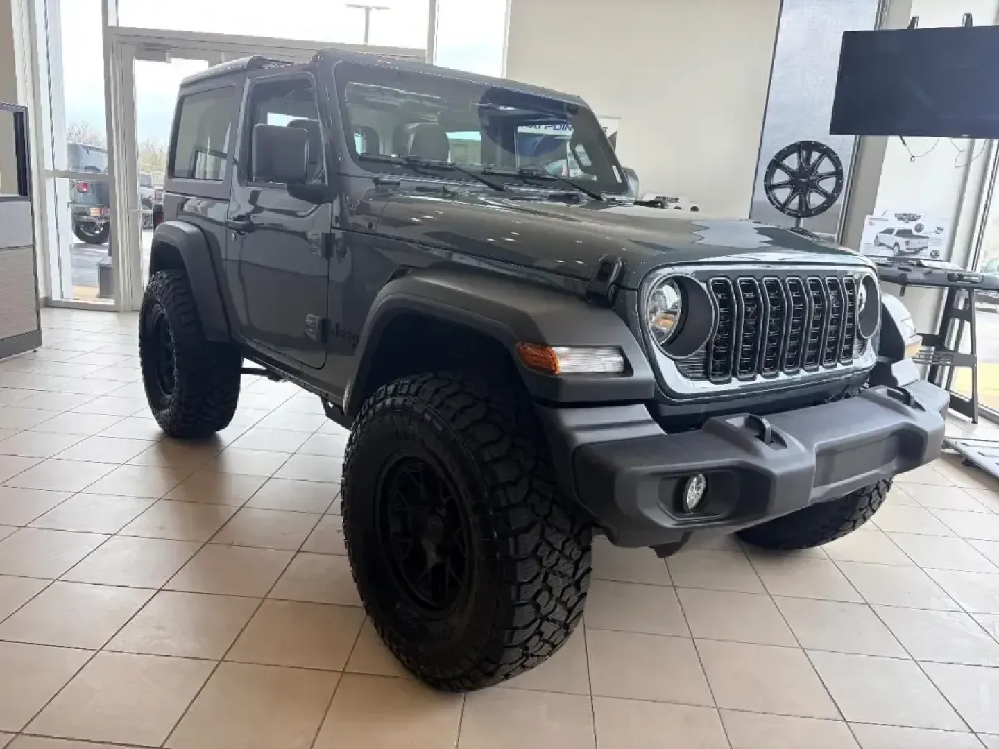 2026 /Black Jeep Wrangler Sport (1C4PJXAN7TW) with an 2.0L L4 DOHC 16V TURBO engine, 6M transmission, located at 12830 Highway 21, De Soto, MO, 63020, (636) 337-7777, 38.153099, -90.573624 - Weekend trail runs, sunny top-down drives, and confident winter commuting in Jefferson County all call for one thing: a Wrangler that's ready to do it all. This **2026 Jeep Wrangler Sport** in standout **Anvil** is the kind of SUV that fits real life in and around **De Soto, Missouri**-whether you'r - Photo#3