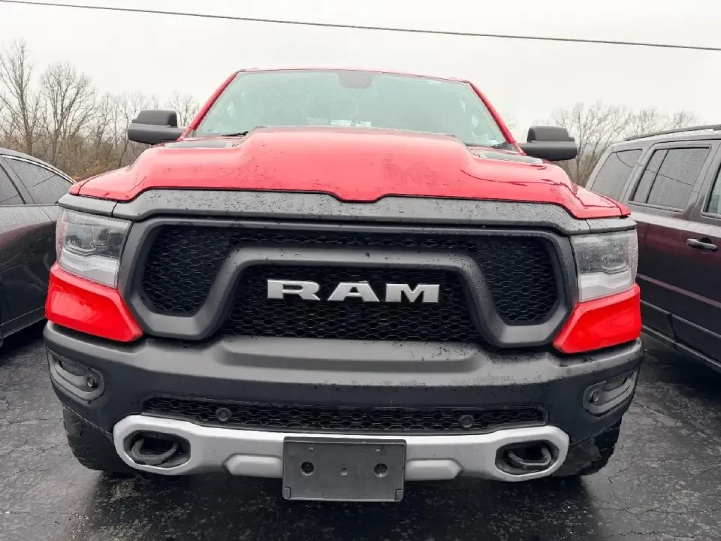 2019 /Black Ram 1500 Rebel (1C6SRFLT2KN) with an 5.7L V8 OHV 16V engine, 8A transmission, located at 12830 Highway 21, De Soto, MO, 63020, (636) 337-7777, 38.153099, -90.573624 - Built for Lake Tishomingo weekends, worksite weekdays, and everything in between, this red 2019 Ram 1500 Rebel is the kind of truck that fits real Missouri life-whether you're hauling gear for a camping trip, commuting up Highway 21, or loading up the crew for a Cardinals game day drive toward St. L - Photo#1