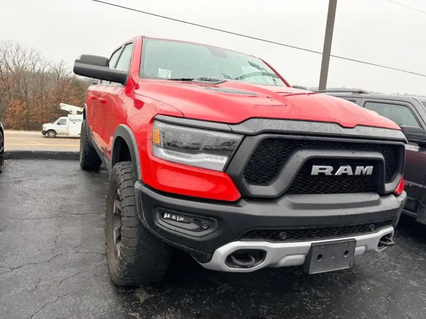 2019 /Black Ram 1500 Rebel (1C6SRFLT2KN) with an 5.7L V8 OHV 16V engine, 8A transmission, located at 12830 Highway 21, De Soto, MO, 63020, (636) 337-7777, 38.153099, -90.573624 - Built for Lake Tishomingo weekends, worksite weekdays, and everything in between, this red 2019 Ram 1500 Rebel is the kind of truck that fits real Missouri life-whether you're hauling gear for a camping trip, commuting up Highway 21, or loading up the crew for a Cardinals game day drive toward St. L - Photo#2