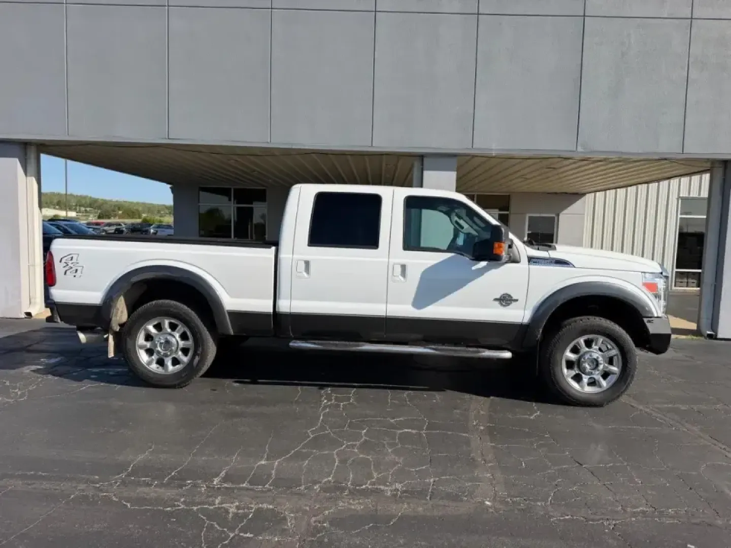 2015 /Black Leather Ford F-250SD Lariat (1FT7W2BT0FE) with an 6.7L engine, 6-Speed Automatic transmission, located at 141 Commercial Dr, Fredericktown, MO, 63645, (573) 783-6432, 37.570087, -90.320648 - When your weekends revolve around hauling a trailer to the lake, tackling a jobsite before sunrise, or packing the family up for a long highway run through the Ozarks, you need a truck that feels confident, comfortable, and ready for real work. This **2015 Ford F-250 Super Duty King Ranch Crew Cab 4 - Photo#1