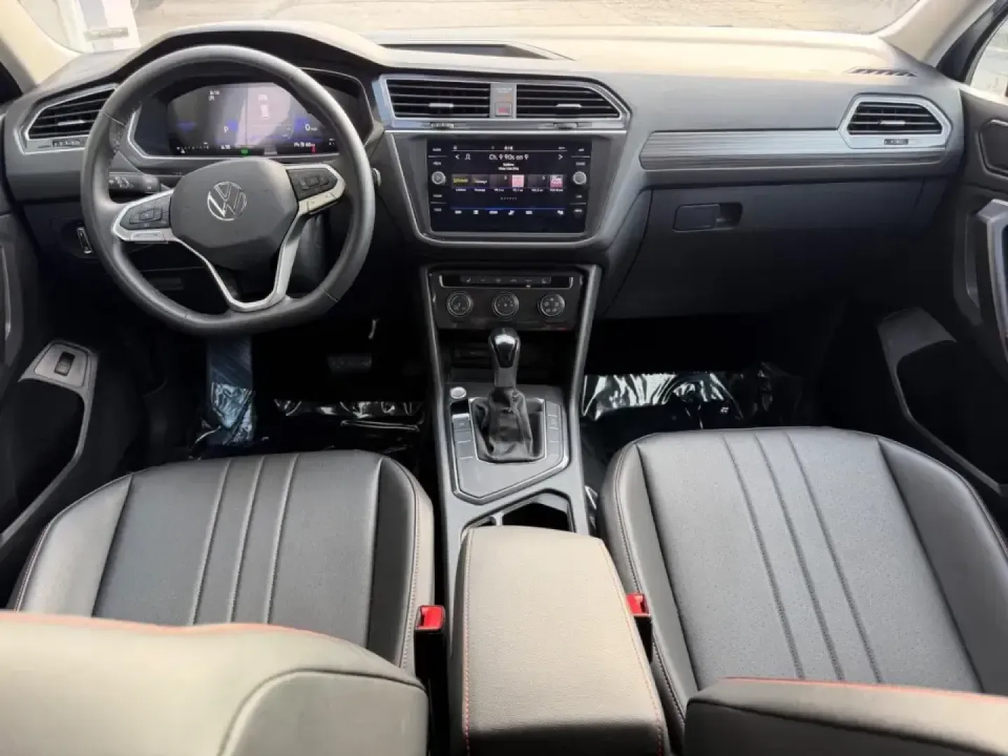 2024 /Titan Black w/Orange Leather Volkswagen Tiguan 2.0T Wolfsburg Edition (3VV6B7AX6RM) with an 2.0L TSI DOHC 16-Valve Turbocharged 4-Cyl engine, Automatic transmission, located at 141 Commercial Dr, Fredericktown, MO, 63645, (573) 783-6432, 37.570087, -90.320648 - Need one SUV that can handle the weekday school-and-work shuffle and still feel ready for a weekend escape down Highway 67? This **2024 Volkswagen Tiguan Wolfsburg Edition** is built for real life in Southeast Missouri-comfortable for long commutes, easy to park around town, and roomy enough for roa - Photo#11
