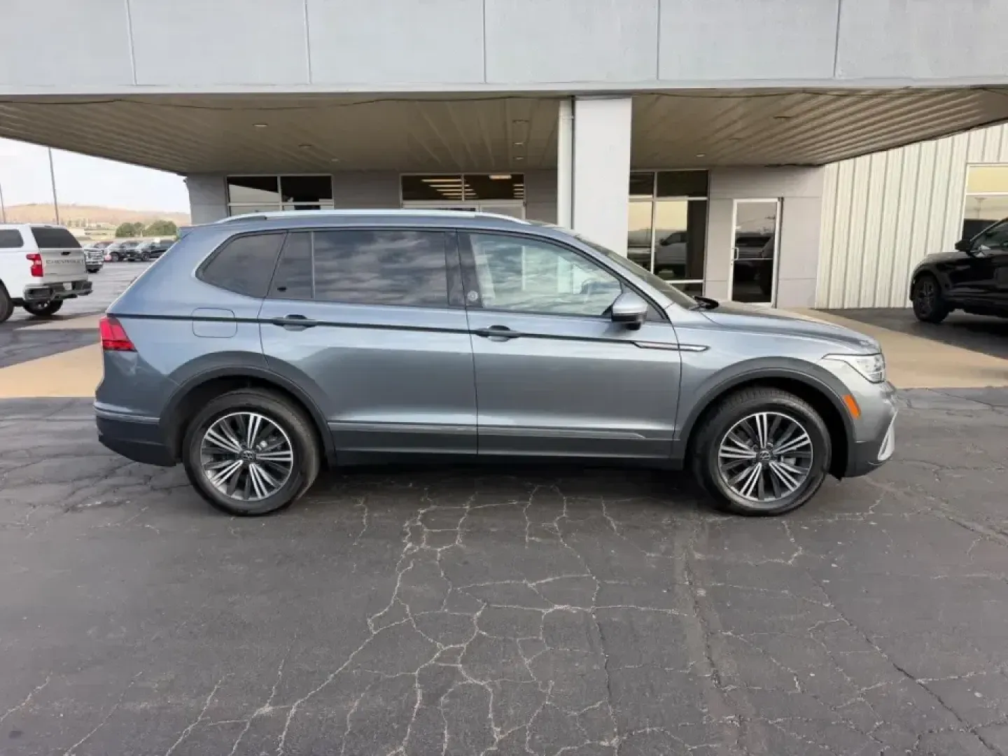2024 /Titan Black w/Orange Leather Volkswagen Tiguan 2.0T Wolfsburg Edition (3VV6B7AX6RM) with an 2.0L TSI DOHC 16-Valve Turbocharged 4-Cyl engine, Automatic transmission, located at 141 Commercial Dr, Fredericktown, MO, 63645, (573) 783-6432, 37.570087, -90.320648 - Need one SUV that can handle the weekday school-and-work shuffle and still feel ready for a weekend escape down Highway 67? This **2024 Volkswagen Tiguan Wolfsburg Edition** is built for real life in Southeast Missouri-comfortable for long commutes, easy to park around town, and roomy enough for roa - Photo#1
