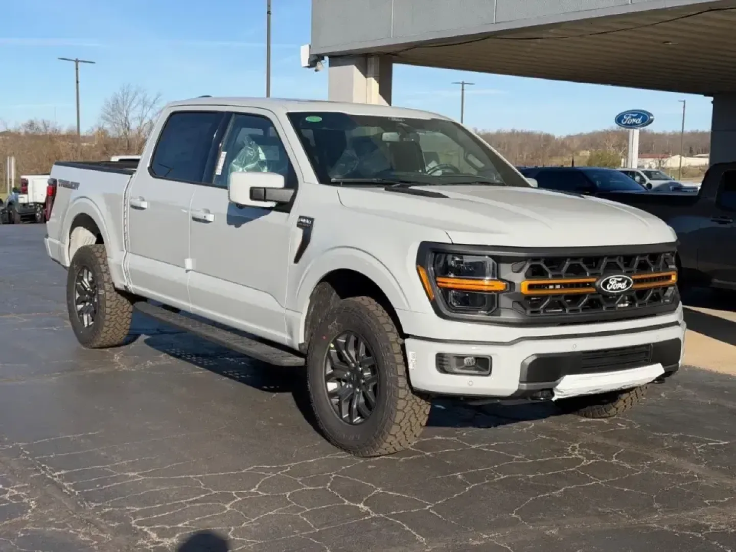 2026 /Black Leather Ford F-150 Tremor (1FTFW4L50TF) with an 5.0L engine, Automatic transmission, located at 141 Commercial Dr, Fredericktown, MO, 63645, (573) 783-6432, 37.570087, -90.320648 - Ready for weekend trail runs in the St. Francois Mountains, a confident tow rig for lake days, and a comfortable daily driver for the commute down US-67? This 2026 Ford F-150 Tremor is built for Missouri life-where work, family, and adventure all share the same calendar. With just 17 miles on the od - Photo#0