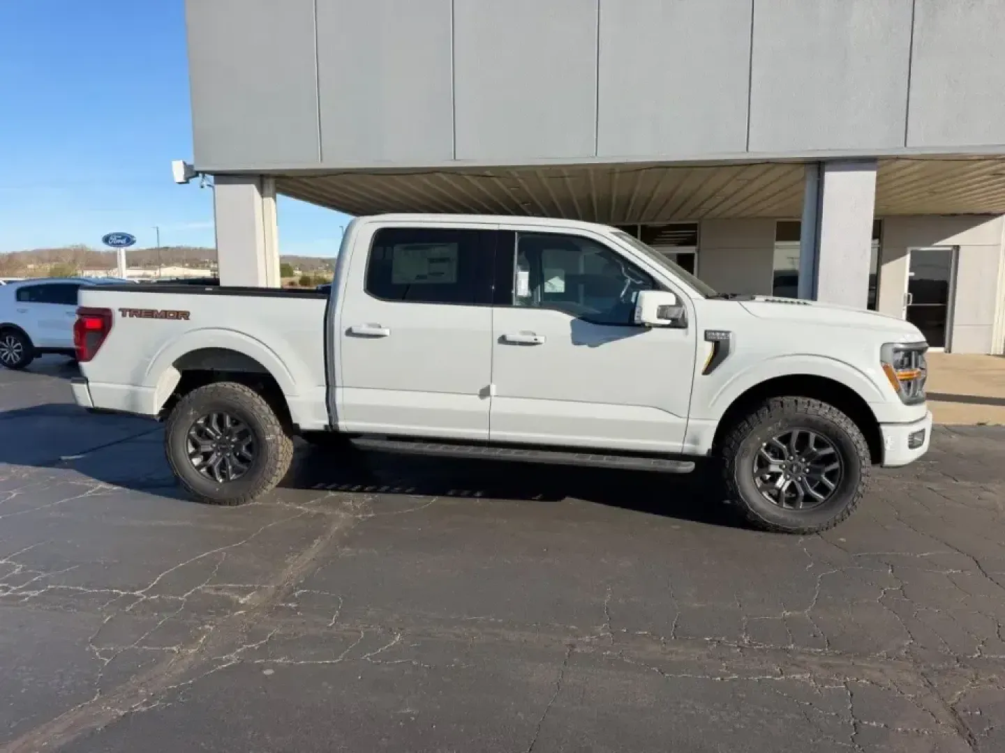2026 /Black Leather Ford F-150 Tremor (1FTFW4L50TF) with an 5.0L engine, Automatic transmission, located at 141 Commercial Dr, Fredericktown, MO, 63645, (573) 783-6432, 37.570087, -90.320648 - Ready for weekend trail runs in the St. Francois Mountains, a confident tow rig for lake days, and a comfortable daily driver for the commute down US-67? This 2026 Ford F-150 Tremor is built for Missouri life-where work, family, and adventure all share the same calendar. With just 17 miles on the od - Photo#1