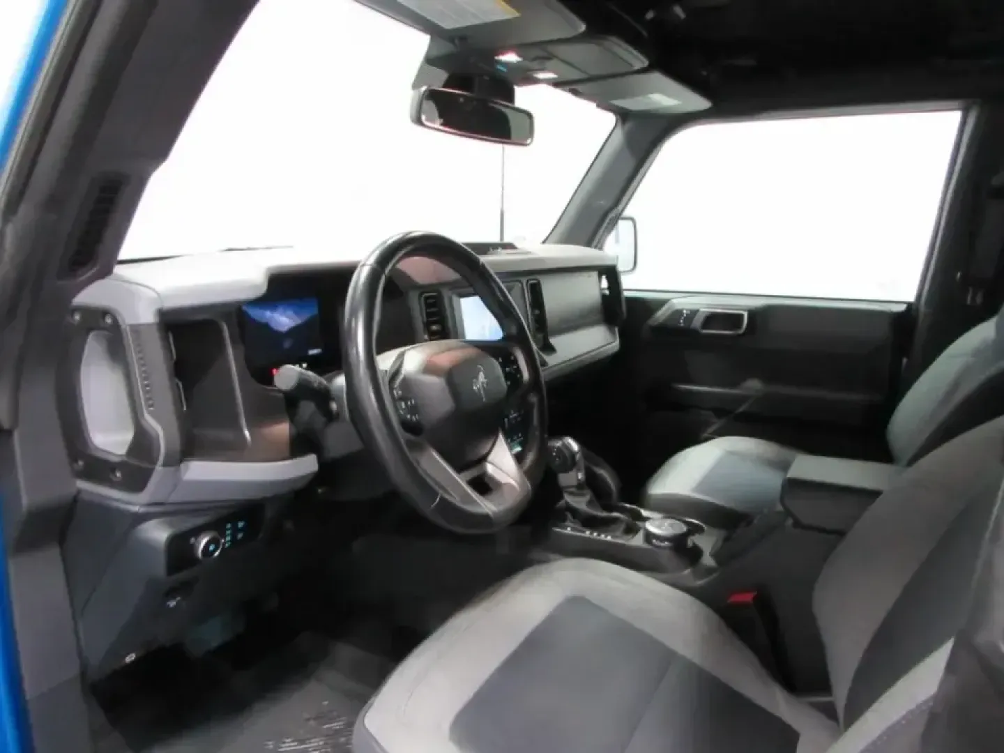 2023 /Dark Gray W/Black Onyx Ford Bronco Big Bend (1FMEE5BP5PL) with an 2.7L V6 DOHC 24V engine, 7M transmission, located at 12836 Highway 21, De Soto, MO, 63020, (636) 337-7777, 38.151867, -90.575615 - Weekend trails, lake days, and road trips down Hwy 21 feel better when your SUV is built to handle the plan-and the unexpected. This **2023 Ford Bronco Base 4-Door** in bold **Blue** is the kind of adventure-ready rig that fits real life in and around **De Soto, Missouri**: confident in bad weather, - Photo#12
