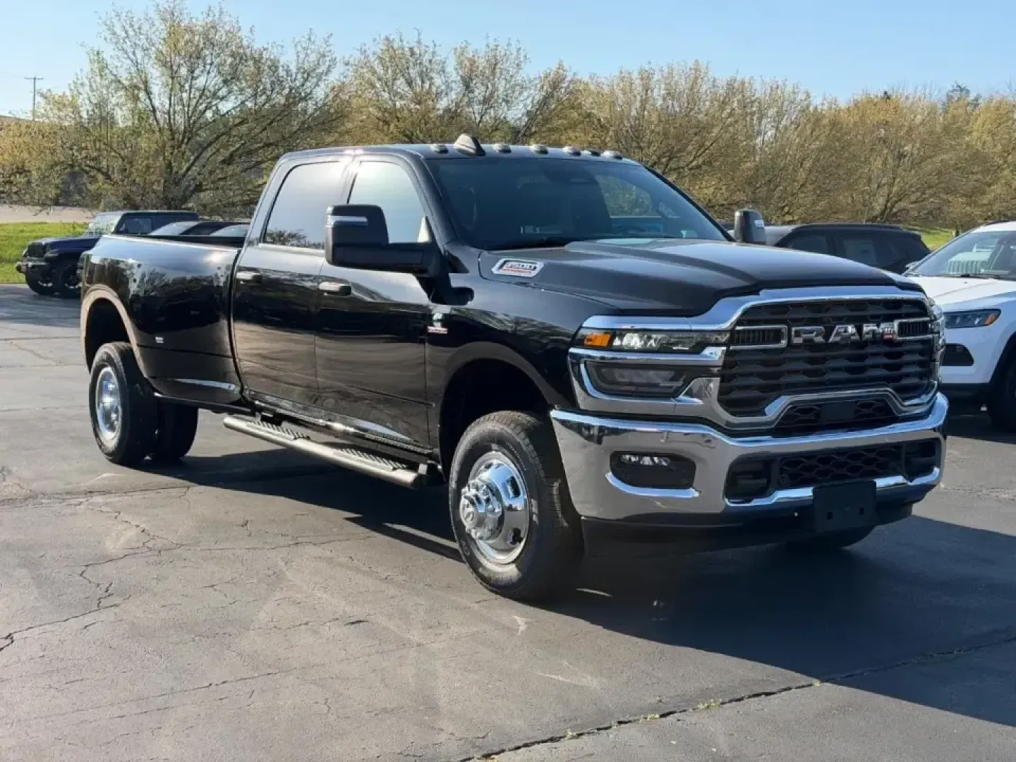2026 /Diesel Gray/Black Cloth Ram 3500 Tradesman (3C63RRGL6TG) with an Straight 6 Turbocharged Diesel engine, 6A transmission, located at 970 Woodlawn Dr., Farmington, MO, 63640, (573) 431-7800, 37.825642, -90.468674 - Built for the kind of days that don't stop at the city limits, this 2026 Ram 3500 Tradesman is the truck you choose when weekend projects turn into full-on builds, when camping gear becomes a lifestyle, and when Missouri backroads demand real capability. Whether you're hauling materials to a job sit - Photo#0
