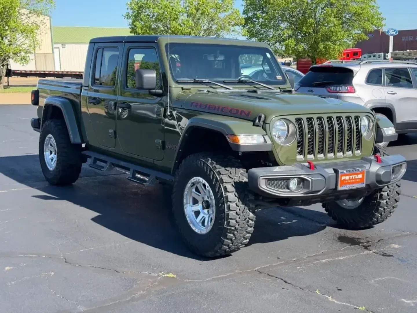 2021 /Black Cloth Jeep Gladiator Rubicon (1C6JJTBG2ML) with an 3.6L V6 24V VVT UPG I engine, Automatic transmission, located at 970 Woodlawn Dr., Farmington, MO, 63640, (573) 431-7800, 37.825642, -90.468674 - Whether your weekends revolve around scouting new trails in the Mark Twain National Forest, towing toys to a lake day, or simply wanting a truck that can handle Farmington's changing seasons with confidence, this **2021 Jeep Gladiator Rubicon 4x4** is built for the lifestyle. With its unmistakable J - Photo#1