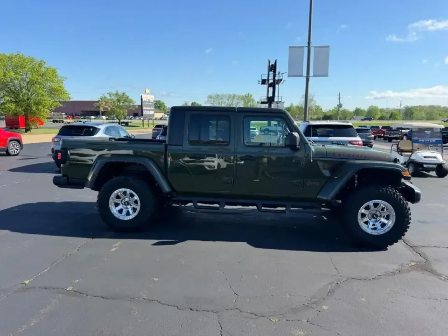 2021 /Black Cloth Jeep Gladiator Rubicon (1C6JJTBG2ML) with an 3.6L V6 24V VVT UPG I engine, Automatic transmission, located at 970 Woodlawn Dr., Farmington, MO, 63640, (573) 431-7800, 37.825642, -90.468674 - Whether your weekends revolve around scouting new trails in the Mark Twain National Forest, towing toys to a lake day, or simply wanting a truck that can handle Farmington's changing seasons with confidence, this **2021 Jeep Gladiator Rubicon 4x4** is built for the lifestyle. With its unmistakable J - Photo#2