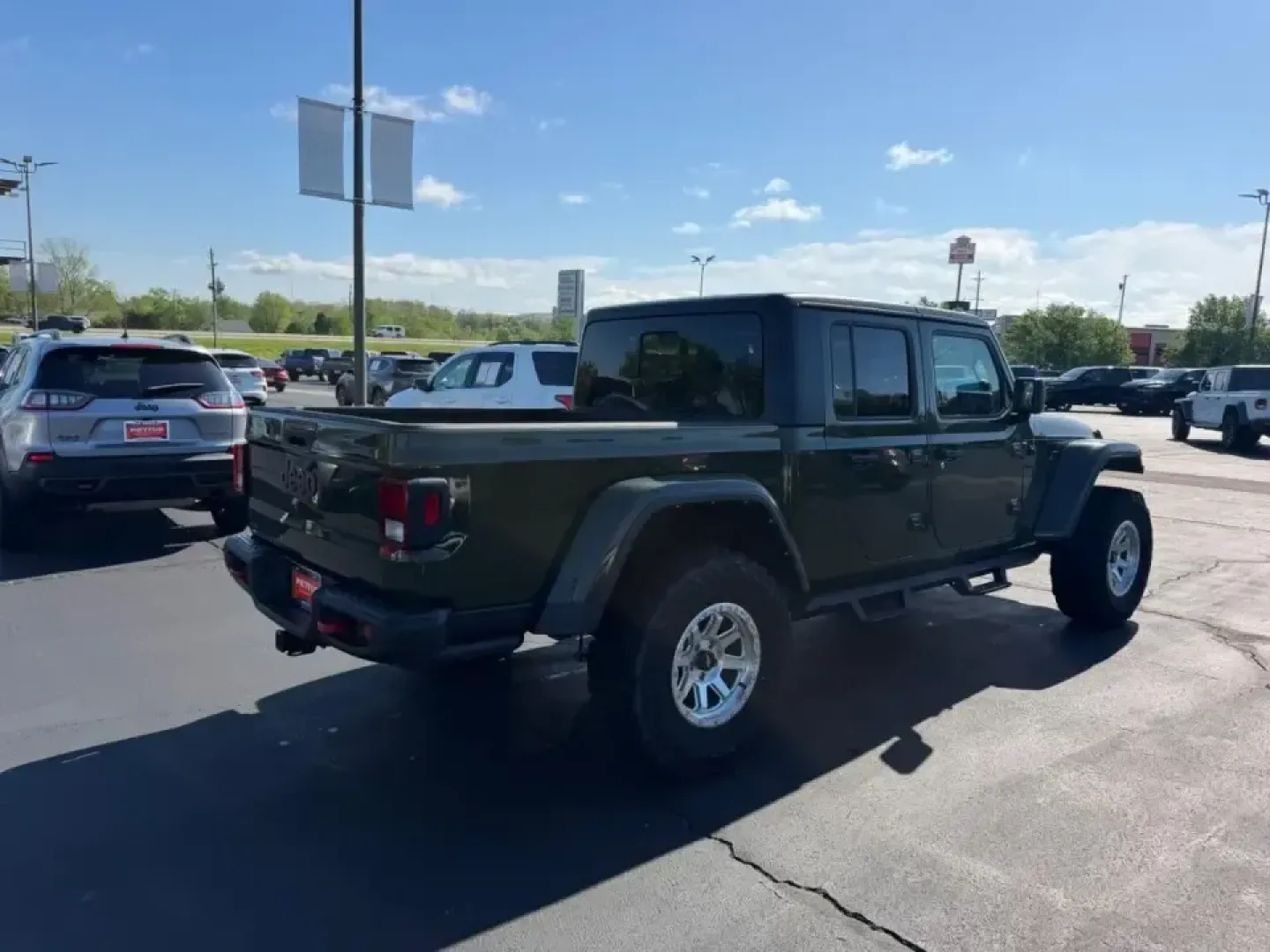 2021 /Black Cloth Jeep Gladiator Rubicon (1C6JJTBG2ML) with an 3.6L V6 24V VVT UPG I engine, Automatic transmission, located at 970 Woodlawn Dr., Farmington, MO, 63640, (573) 431-7800, 37.825642, -90.468674 - Whether your weekends revolve around scouting new trails in the Mark Twain National Forest, towing toys to a lake day, or simply wanting a truck that can handle Farmington's changing seasons with confidence, this **2021 Jeep Gladiator Rubicon 4x4** is built for the lifestyle. With its unmistakable J - Photo#3