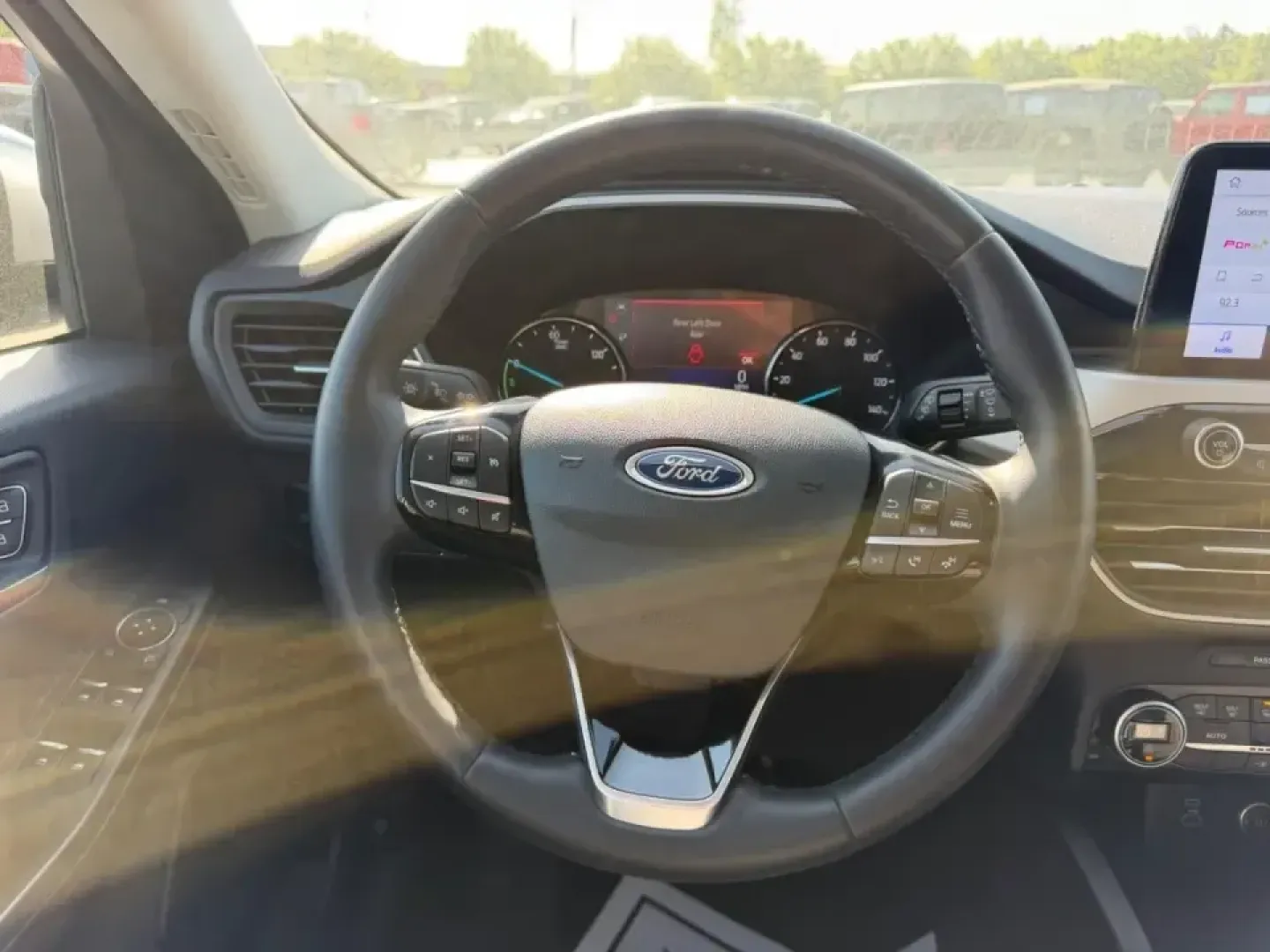 2021 /Dark Earth Gray Cloth Ford Escape SE (1FMCU0BZ4MU) with an 2.5L iVCT Atkinson Cycle I-4 Hybrid engine, Automatic transmission, located at 970 Woodlawn Dr., Farmington, MO, 63640, (573) 431-7800, 37.825642, -90.468674 - Weekday commutes down Highway 67, school drop-offs around Farmington, and spontaneous weekend getaways toward St. Joe State Park get a whole lot easier when your SUV is comfortable, efficient, and ready for real life. This **2021 Ford Escape SE Hybrid** blends smart fuel savings with the versatility - Photo#11