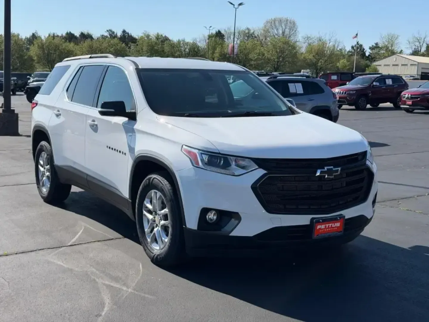 2021 /Jet Black Cloth Chevrolet Traverse LT 1LT (1GNEVGKW1MJ) with an 3.6L V6 / SIDI / VVT engine, Automatic transmission, located at 970 Woodlawn Dr., Farmington, MO, 63640, (573) 431-7800, 37.825642, -90.468674 - Pack up the kids, load the cooler, and point the nose toward weekend fun-this 2021 Chevrolet Traverse LT 1LT is built for real-life family logistics and road-trip comfort, with the confidence of All Wheel Drive for Missouri weather and those last-minute getaways. If you've been searching for a spaci - Photo#0