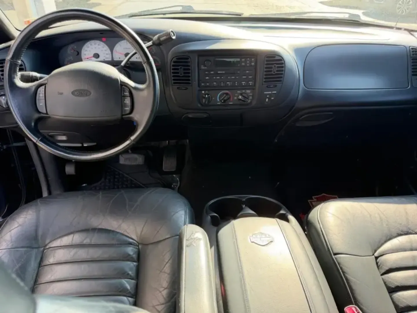 2000 /Black Leather Ford F-150 Harley-Davidson (2FTRX07L3YC) with an 5.4L engine, 4-Speed Automatic Overdrive transmission, located at 141 Commercial Dr, Fredericktown, MO, 63645, (573) 783-6432, 37.570087, -90.320648 - Own the commute, the campsite, and the weekend cruise with a truck that turns errands into an experience: this 2000 Ford F-150 Harley-Davidson Edition is built for drivers who want classic American style with real everyday usefulness. Whether you're hauling gear to a tailgate, towing a small trailer - Photo#9