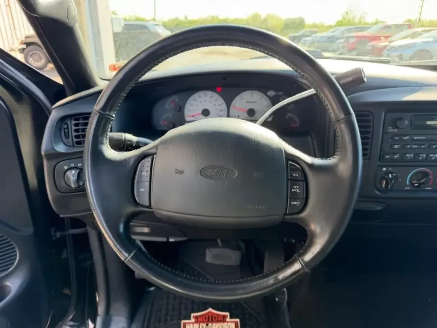 2000 /Black Leather Ford F-150 Harley-Davidson (2FTRX07L3YC) with an 5.4L engine, 4-Speed Automatic Overdrive transmission, located at 141 Commercial Dr, Fredericktown, MO, 63645, (573) 783-6432, 37.570087, -90.320648 - Own the commute, the campsite, and the weekend cruise with a truck that turns errands into an experience: this 2000 Ford F-150 Harley-Davidson Edition is built for drivers who want classic American style with real everyday usefulness. Whether you're hauling gear to a tailgate, towing a small trailer - Photo#10