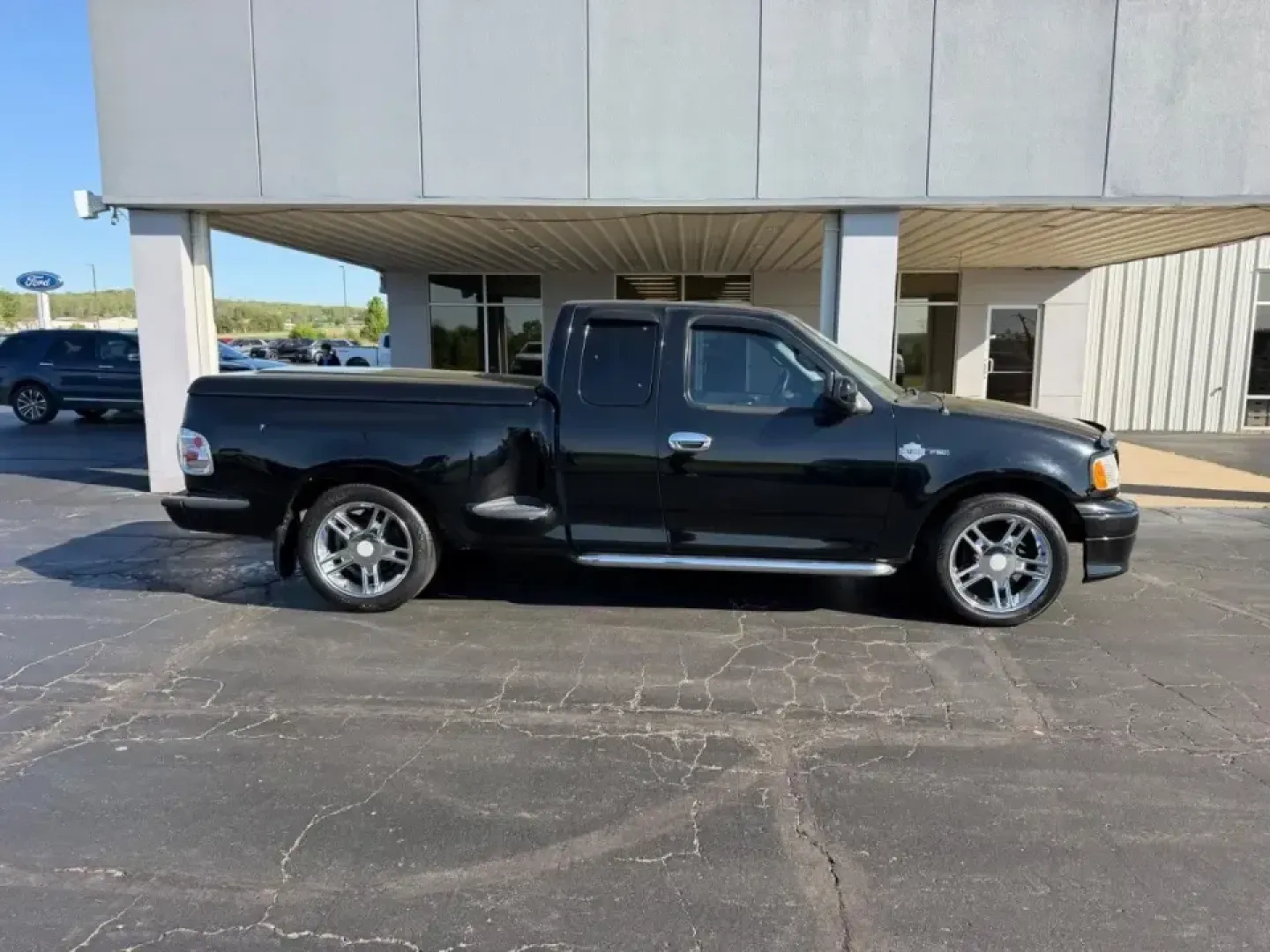 2000 /Black Leather Ford F-150 Harley-Davidson (2FTRX07L3YC) with an 5.4L engine, 4-Speed Automatic Overdrive transmission, located at 141 Commercial Dr, Fredericktown, MO, 63645, (573) 783-6432, 37.570087, -90.320648 - Own the commute, the campsite, and the weekend cruise with a truck that turns errands into an experience: this 2000 Ford F-150 Harley-Davidson Edition is built for drivers who want classic American style with real everyday usefulness. Whether you're hauling gear to a tailgate, towing a small trailer - Photo#1