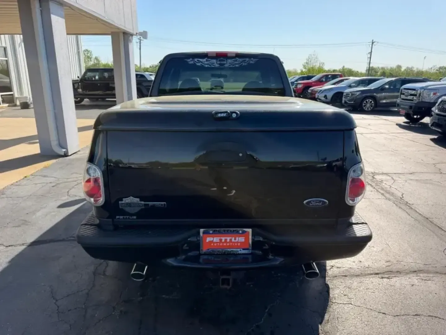 2000 /Black Leather Ford F-150 Harley-Davidson (2FTRX07L3YC) with an 5.4L engine, 4-Speed Automatic Overdrive transmission, located at 141 Commercial Dr, Fredericktown, MO, 63645, (573) 783-6432, 37.570087, -90.320648 - Own the commute, the campsite, and the weekend cruise with a truck that turns errands into an experience: this 2000 Ford F-150 Harley-Davidson Edition is built for drivers who want classic American style with real everyday usefulness. Whether you're hauling gear to a tailgate, towing a small trailer - Photo#3