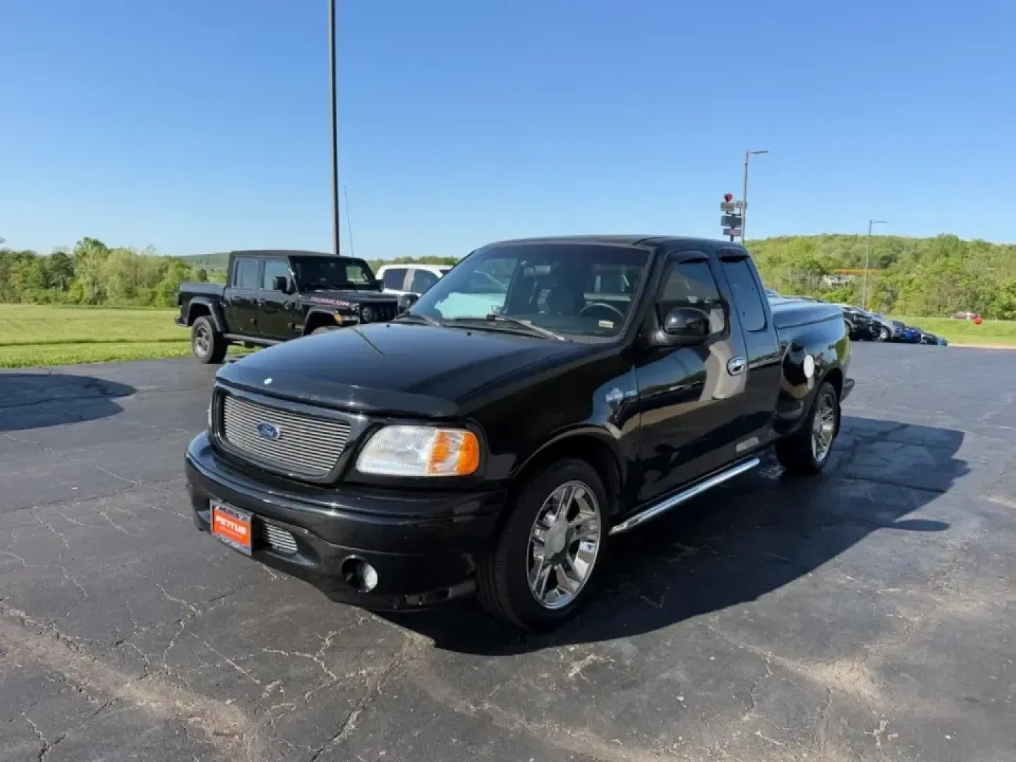 2000 /Black Leather Ford F-150 Harley-Davidson (2FTRX07L3YC) with an 5.4L engine, 4-Speed Automatic Overdrive transmission, located at 141 Commercial Dr, Fredericktown, MO, 63645, (573) 783-6432, 37.570087, -90.320648 - Own the commute, the campsite, and the weekend cruise with a truck that turns errands into an experience: this 2000 Ford F-150 Harley-Davidson Edition is built for drivers who want classic American style with real everyday usefulness. Whether you're hauling gear to a tailgate, towing a small trailer - Photo#6