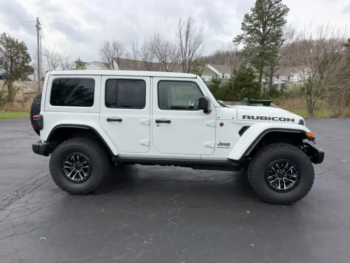 2026 /Black Leather Jeep Wrangler Rubicon X (1C4RJXFG4TW) with an 3.6L V6 engine, 6M transmission, located at 970 Woodlawn Dr., Farmington, MO, 63640, (573) 431-7800, 37.825642, -90.468674 - If your weekends revolve around trail days, river runs, and spontaneous road trips-and your weekdays still demand a comfortable, confidence-inspiring commuter-this 2026 Jeep Wrangler Rubicon is built for the lifestyle. With just 25 miles, it feels fresh off the factory line, ready to tackle Missouri - Photo#1
