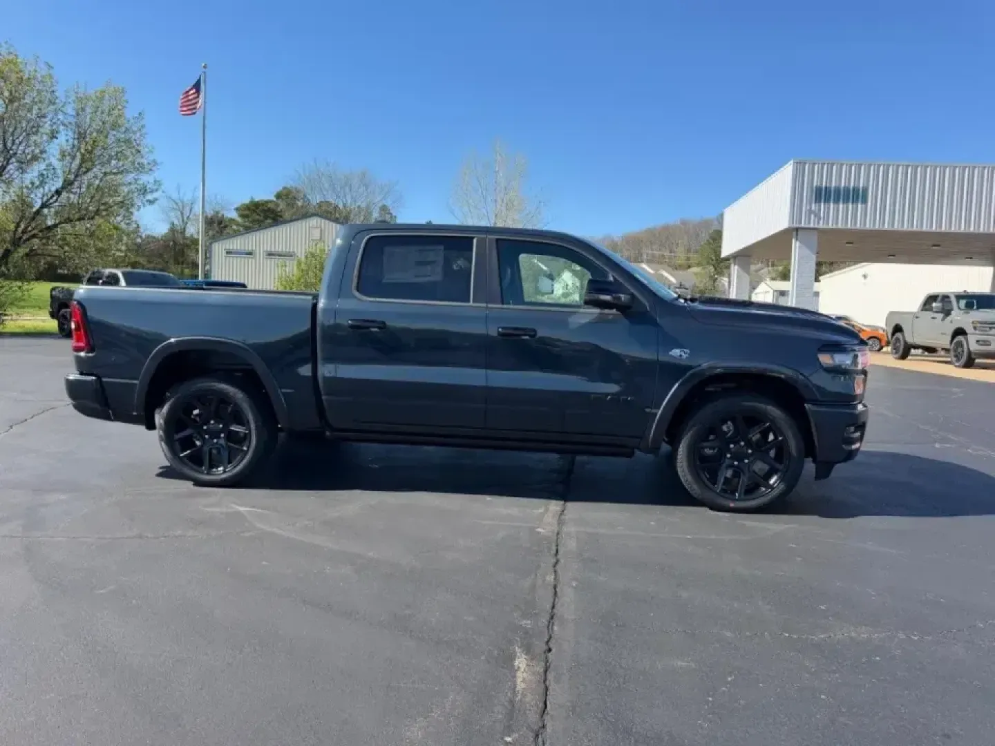2026 /Black Leather Ram 1500 Laramie (1C6SRFJT0TN) with an 5.7L engine, Automatic transmission, located at 970 Woodlawn Dr., Farmington, MO, 63640, (573) 431-7800, 37.825642, -90.468674 - Whether your weekends revolve around pulling a boat toward St. Joe State Park, hauling supplies for a home project, or cruising comfortably between Farmington and St. Louis on Highway 67, this truck is built for real-life Missouri driving. The 2026 Ram 1500 Laramie in bold Forged Red delivers the ki - Photo#1