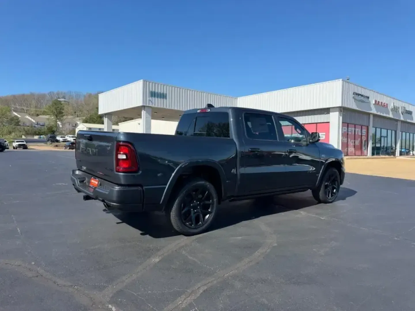 2026 /Black Leather Ram 1500 Laramie (1C6SRFJT0TN) with an 5.7L engine, Automatic transmission, located at 970 Woodlawn Dr., Farmington, MO, 63640, (573) 431-7800, 37.825642, -90.468674 - Whether your weekends revolve around pulling a boat toward St. Joe State Park, hauling supplies for a home project, or cruising comfortably between Farmington and St. Louis on Highway 67, this truck is built for real-life Missouri driving. The 2026 Ram 1500 Laramie in bold Forged Red delivers the ki - Photo#2