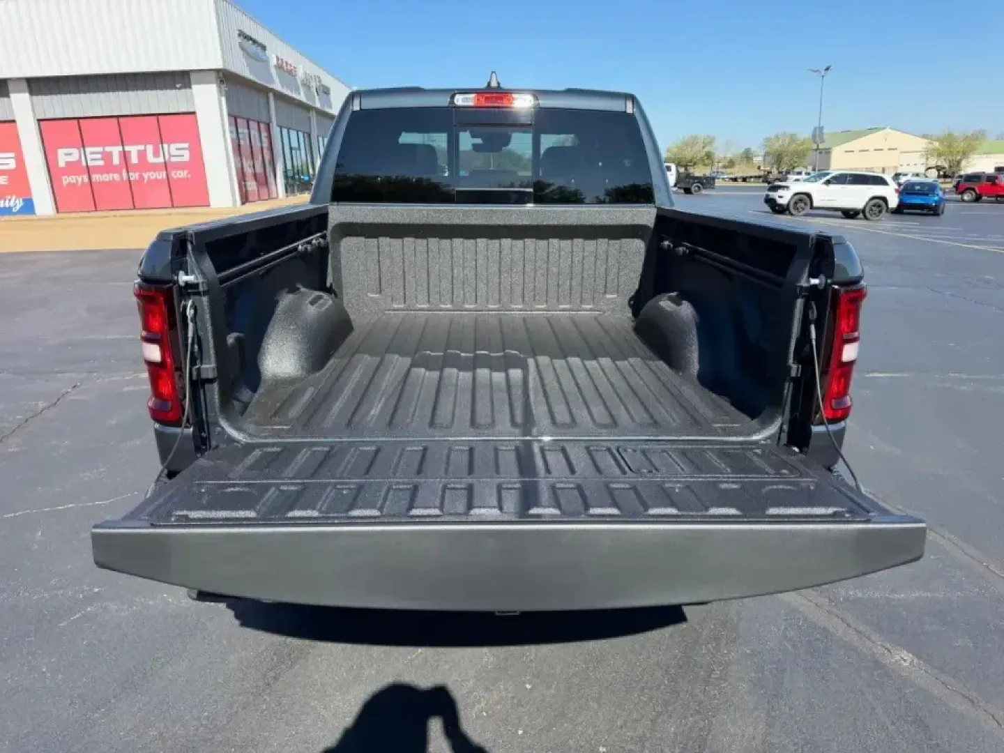 2026 /Black Leather Ram 1500 Laramie (1C6SRFJT0TN) with an 5.7L engine, Automatic transmission, located at 970 Woodlawn Dr., Farmington, MO, 63640, (573) 431-7800, 37.825642, -90.468674 - Whether your weekends revolve around pulling a boat toward St. Joe State Park, hauling supplies for a home project, or cruising comfortably between Farmington and St. Louis on Highway 67, this truck is built for real-life Missouri driving. The 2026 Ram 1500 Laramie in bold Forged Red delivers the ki - Photo#4