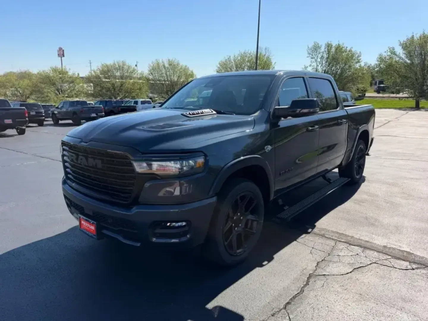 2026 /Black Leather Ram 1500 Laramie (1C6SRFJT0TN) with an 5.7L engine, Automatic transmission, located at 970 Woodlawn Dr., Farmington, MO, 63640, (573) 431-7800, 37.825642, -90.468674 - Whether your weekends revolve around pulling a boat toward St. Joe State Park, hauling supplies for a home project, or cruising comfortably between Farmington and St. Louis on Highway 67, this truck is built for real-life Missouri driving. The 2026 Ram 1500 Laramie in bold Forged Red delivers the ki - Photo#6