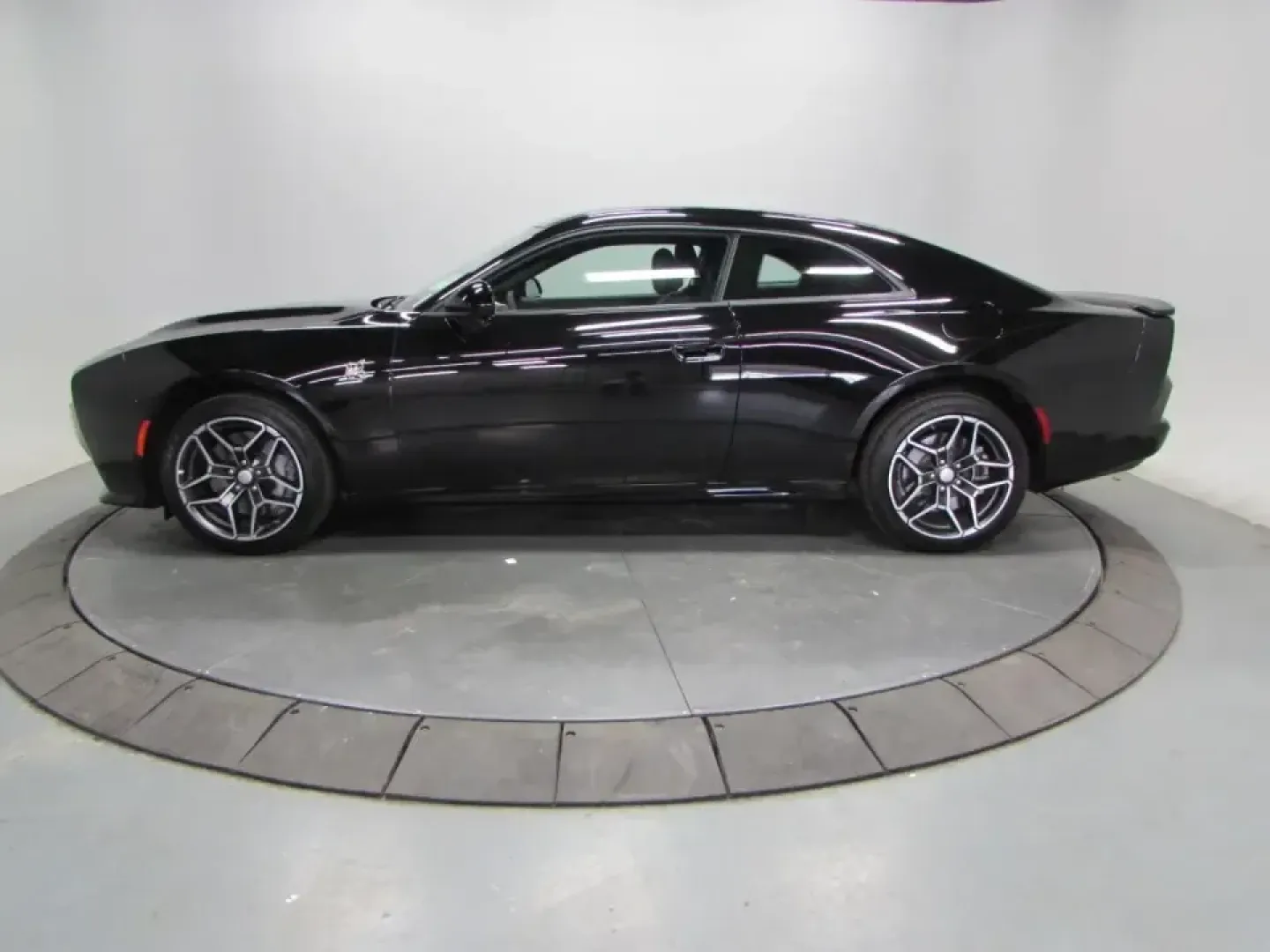 2026 /Black Dodge Charger R/T Scat Pack (2C3CDAMP4TR) with an 3.0L V6 DOHC 24V engine, Automatic transmission, located at 12830 Highway 21, De Soto, MO, 63020, (636) 337-7777, 38.153099, -90.573624 - Weekend road trips down Highway 21, date nights in downtown De Soto, or a daily commute that deserves more than just transportation-this 2026 Dodge Charger R/T Scat Pack is built for drivers who want muscle-car attitude with all-weather confidence. With only 100 miles, this Diam Black coupe feels pr - Photo#3