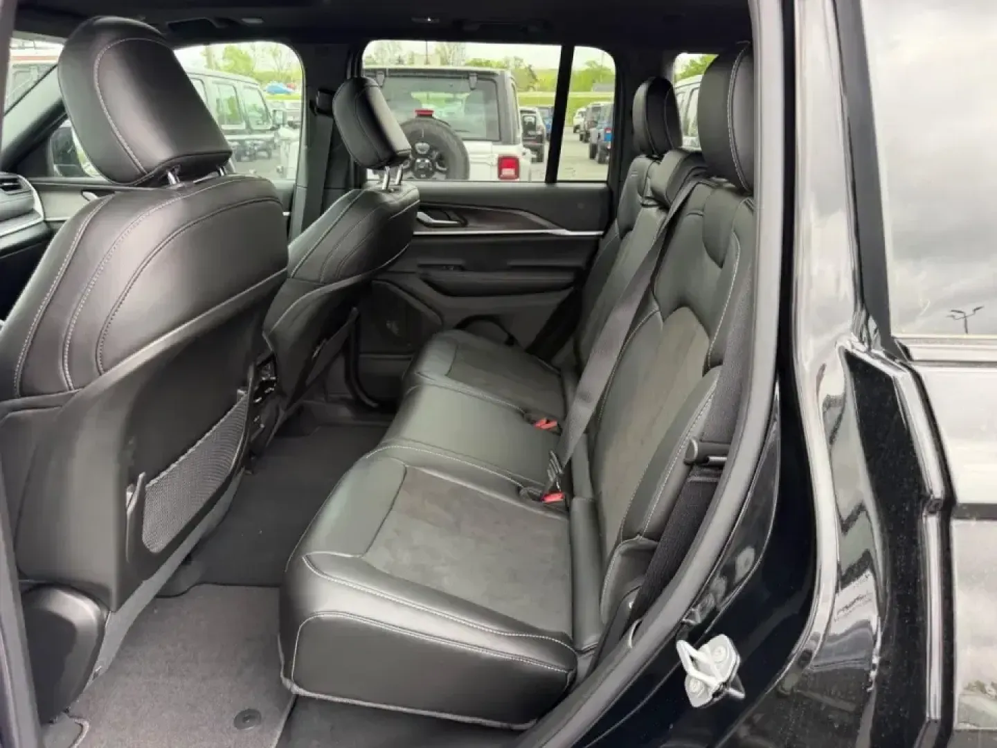 2026 /Global Black Suede Jeep Grand Cherokee Laredo Altitude (1C4RJHAR7TC) with an 2.0L engine, 8A transmission, located at 970 Woodlawn Dr., Farmington, MO, 63640, (573) 431-7800, 37.825642, -90.468674 - Whether your weekends revolve around family road trips to St. Joe State Park, daily commutes up Highway 67, or spontaneous gravel-road getaways through the Ozark foothills, this 2026 Jeep Grand Cherokee Laredo Altitude is built to make every mile feel effortless-and confident. With only 5 miles on t - Photo#9