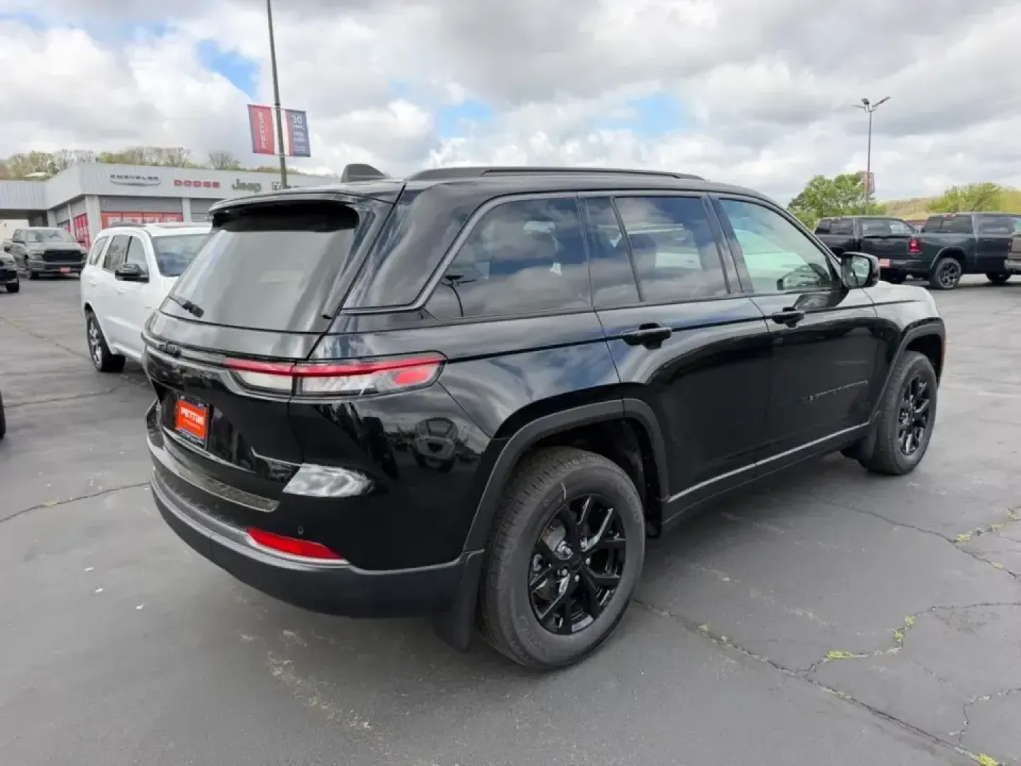 2026 /Global Black Suede Jeep Grand Cherokee Laredo Altitude (1C4RJHAR7TC) with an 2.0L engine, 8A transmission, located at 970 Woodlawn Dr., Farmington, MO, 63640, (573) 431-7800, 37.825642, -90.468674 - Whether your weekends revolve around family road trips to St. Joe State Park, daily commutes up Highway 67, or spontaneous gravel-road getaways through the Ozark foothills, this 2026 Jeep Grand Cherokee Laredo Altitude is built to make every mile feel effortless-and confident. With only 5 miles on t - Photo#2