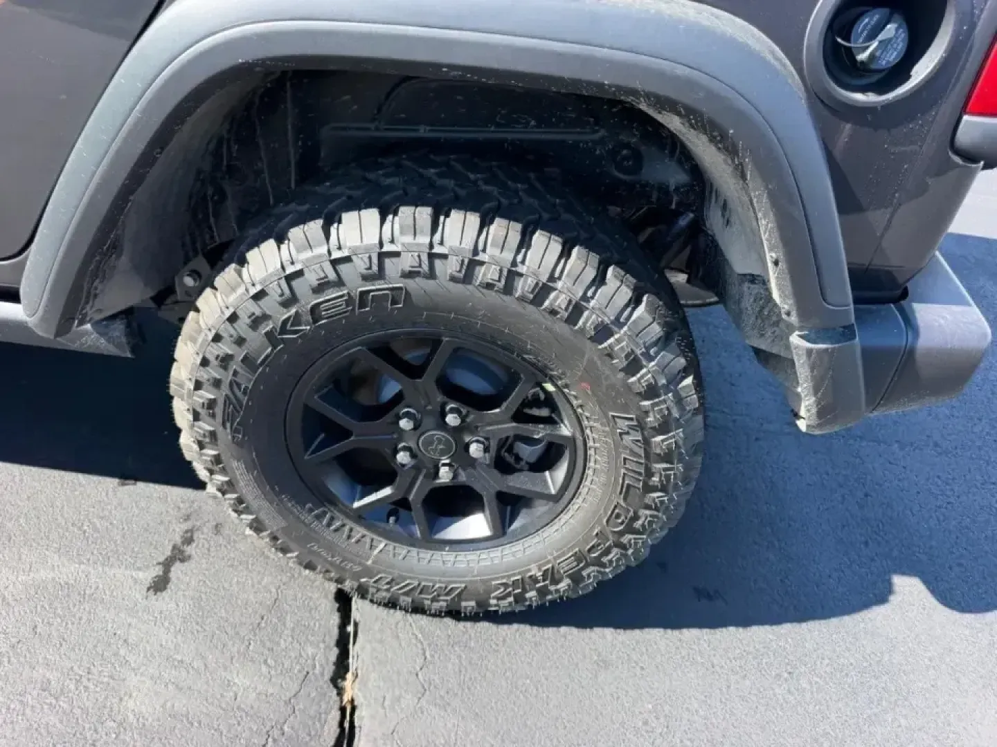 2026 /Black Cloth Jeep Wrangler Willys (1C4PJXDNXTW) with an 2.0L engine, 6M transmission, located at 970 Woodlawn Dr., Farmington, MO, 63640, (573) 431-7800, 37.825642, -90.468674 - Weekend trail runs at St. Joe State Park, a top-down cruise through downtown Farmington, or a confident commute out toward Park Hills and Bonne Terre-this 2026 Jeep Wrangler Sport is built for the kind of life that doesn't stay on pavement. With only **5 miles** on the odometer, it delivers that new - Photo#5