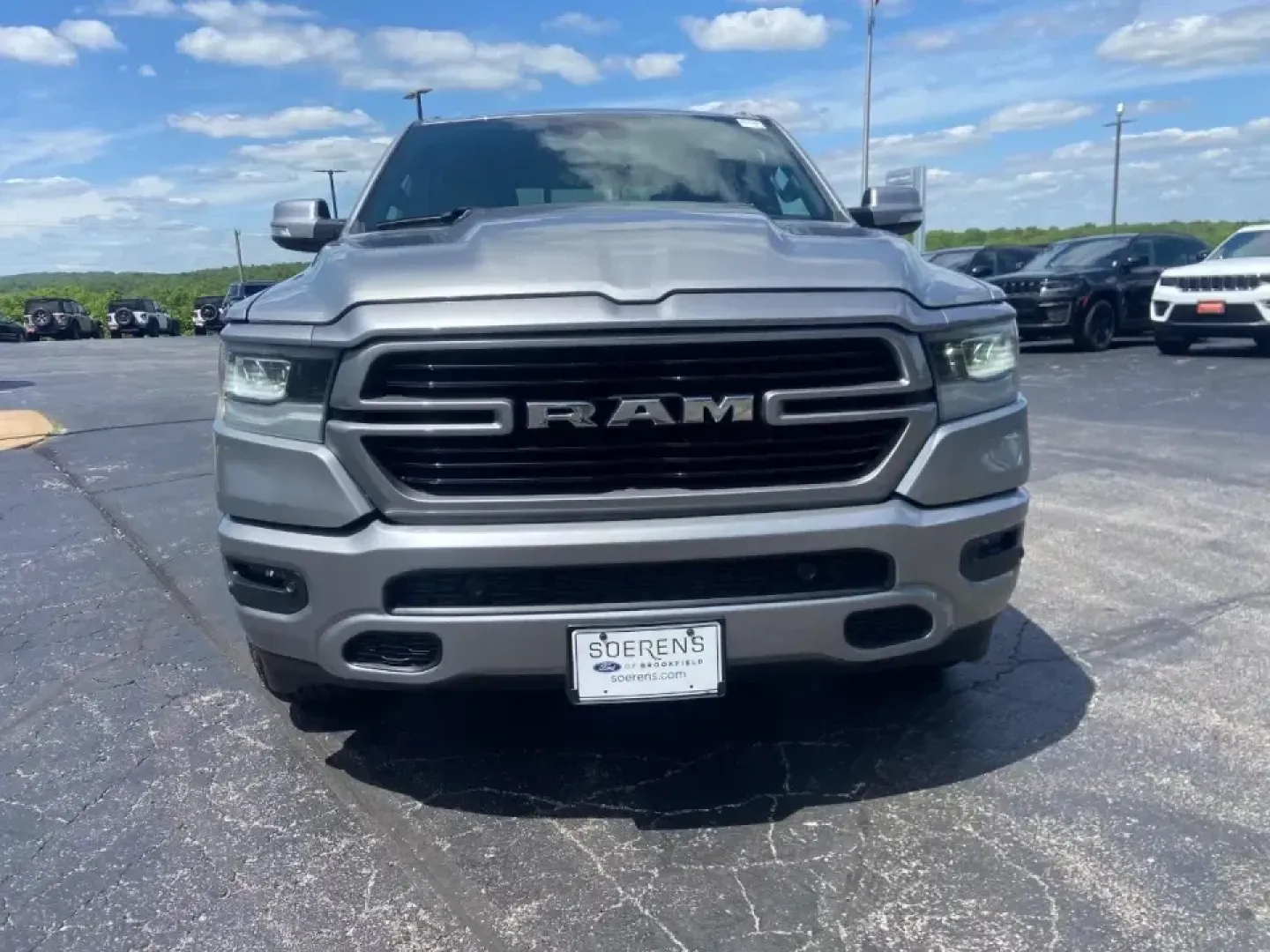 2022 /Black Ram 1500 Laramie (1C6SRFRT0NN) with an 5.7L V8 OHV 16V engine, 8A transmission, located at 12830 Highway 21, De Soto, MO, 63020, (636) 337-7777, 38.153099, -90.573624 - If your weekends bounce between hauling gear, heading out for a lake day, and still needing a comfortable daily driver for work, this **2022 Ram 1500 Laramie Crew Cab LWB 4WD** is built for that real-life rhythm. It's the kind of truck that feels equally at home on an early-morning commute, a family - Photo#1