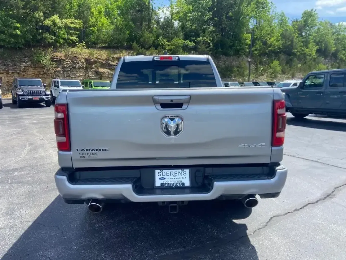 2022 /Black Ram 1500 Laramie (1C6SRFRT0NN) with an 5.7L V8 OHV 16V engine, 8A transmission, located at 12830 Highway 21, De Soto, MO, 63020, (636) 337-7777, 38.153099, -90.573624 - If your weekends bounce between hauling gear, heading out for a lake day, and still needing a comfortable daily driver for work, this **2022 Ram 1500 Laramie Crew Cab LWB 4WD** is built for that real-life rhythm. It's the kind of truck that feels equally at home on an early-morning commute, a family - Photo#5