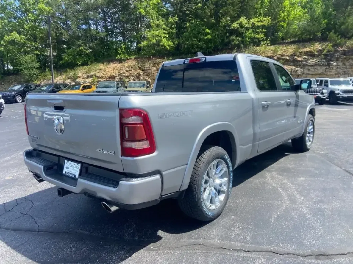 2022 /Black Ram 1500 Laramie (1C6SRFRT0NN) with an 5.7L V8 OHV 16V engine, 8A transmission, located at 12830 Highway 21, De Soto, MO, 63020, (636) 337-7777, 38.153099, -90.573624 - If your weekends bounce between hauling gear, heading out for a lake day, and still needing a comfortable daily driver for work, this **2022 Ram 1500 Laramie Crew Cab LWB 4WD** is built for that real-life rhythm. It's the kind of truck that feels equally at home on an early-morning commute, a family - Photo#6