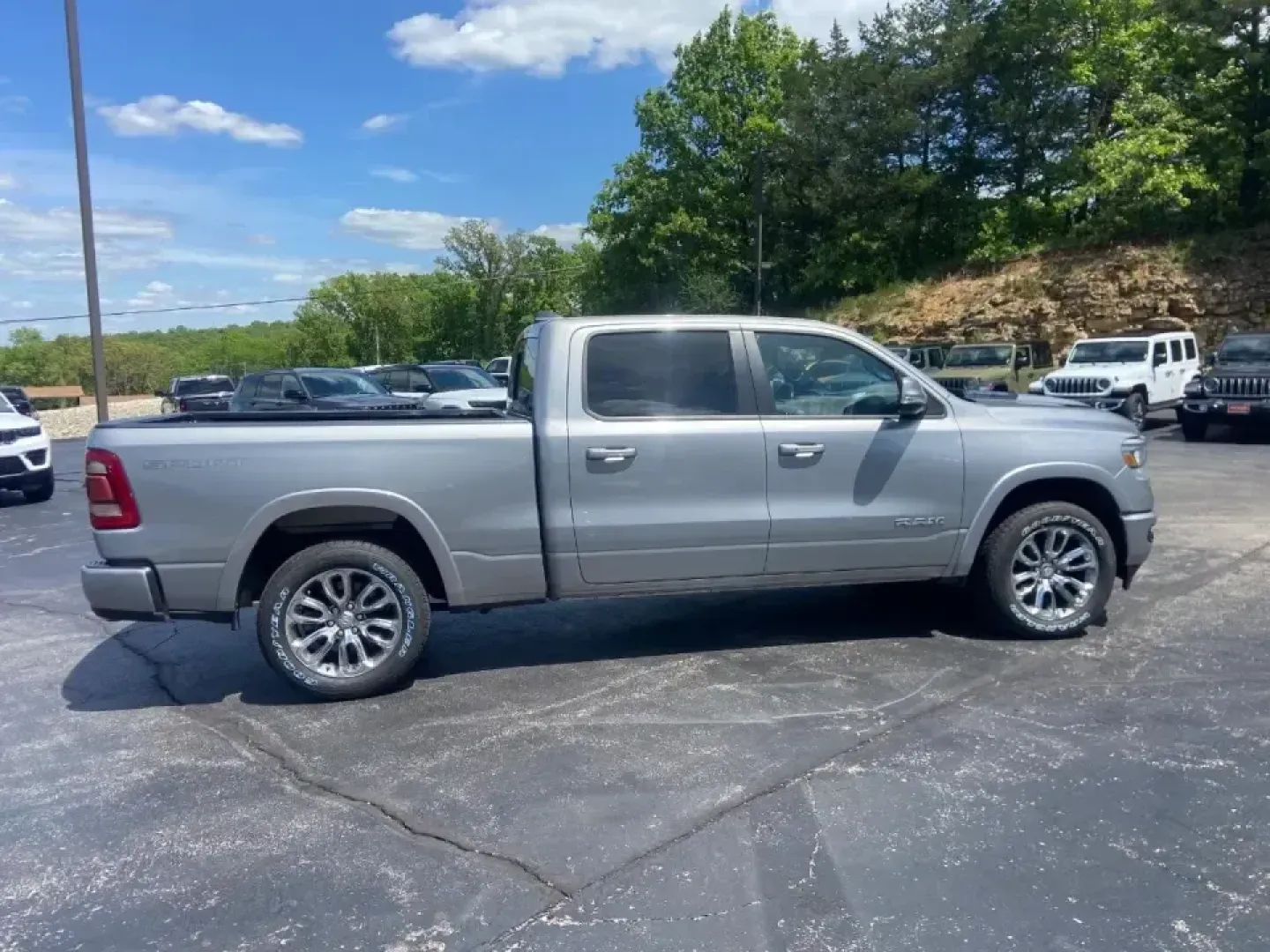 2022 /Black Ram 1500 Laramie (1C6SRFRT0NN) with an 5.7L V8 OHV 16V engine, 8A transmission, located at 12830 Highway 21, De Soto, MO, 63020, (636) 337-7777, 38.153099, -90.573624 - If your weekends bounce between hauling gear, heading out for a lake day, and still needing a comfortable daily driver for work, this **2022 Ram 1500 Laramie Crew Cab LWB 4WD** is built for that real-life rhythm. It's the kind of truck that feels equally at home on an early-morning commute, a family - Photo#7