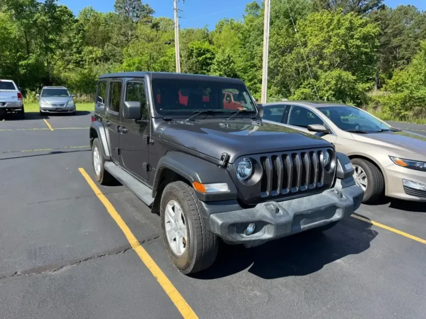2022 /Black Cloth Jeep Wrangler Unlimited Sport RHD Right Hand Drive (1C4HJXKN9NW) with an 2.0L I4 DOHC DI Turbo engine, Automatic transmission, located at 970 Woodlawn Dr., Farmington, MO, 63640, (573) 431-7800, 37.825642, -90.468674 - Weekend adventures, daily commutes, and let's take the long way home drives feel better in a Wrangler-especially when you want real 4x4 capability with modern comfort. This 2022 Jeep Wrangler Unlimited Sport RHD (Right Hand Drive) is a unique SUV that stands out around Farmington, MO, whether you're - Photo#1