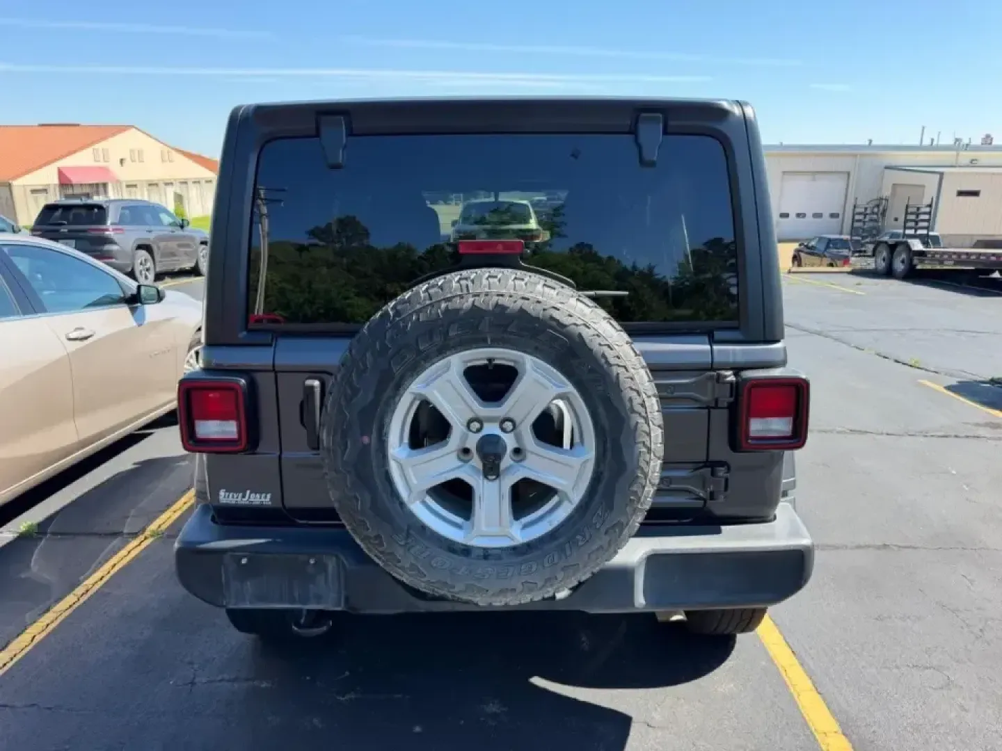 2022 /Black Cloth Jeep Wrangler Unlimited Sport RHD Right Hand Drive (1C4HJXKN9NW) with an 2.0L I4 DOHC DI Turbo engine, Automatic transmission, located at 970 Woodlawn Dr., Farmington, MO, 63640, (573) 431-7800, 37.825642, -90.468674 - Weekend adventures, daily commutes, and let's take the long way home drives feel better in a Wrangler-especially when you want real 4x4 capability with modern comfort. This 2022 Jeep Wrangler Unlimited Sport RHD (Right Hand Drive) is a unique SUV that stands out around Farmington, MO, whether you're - Photo#2